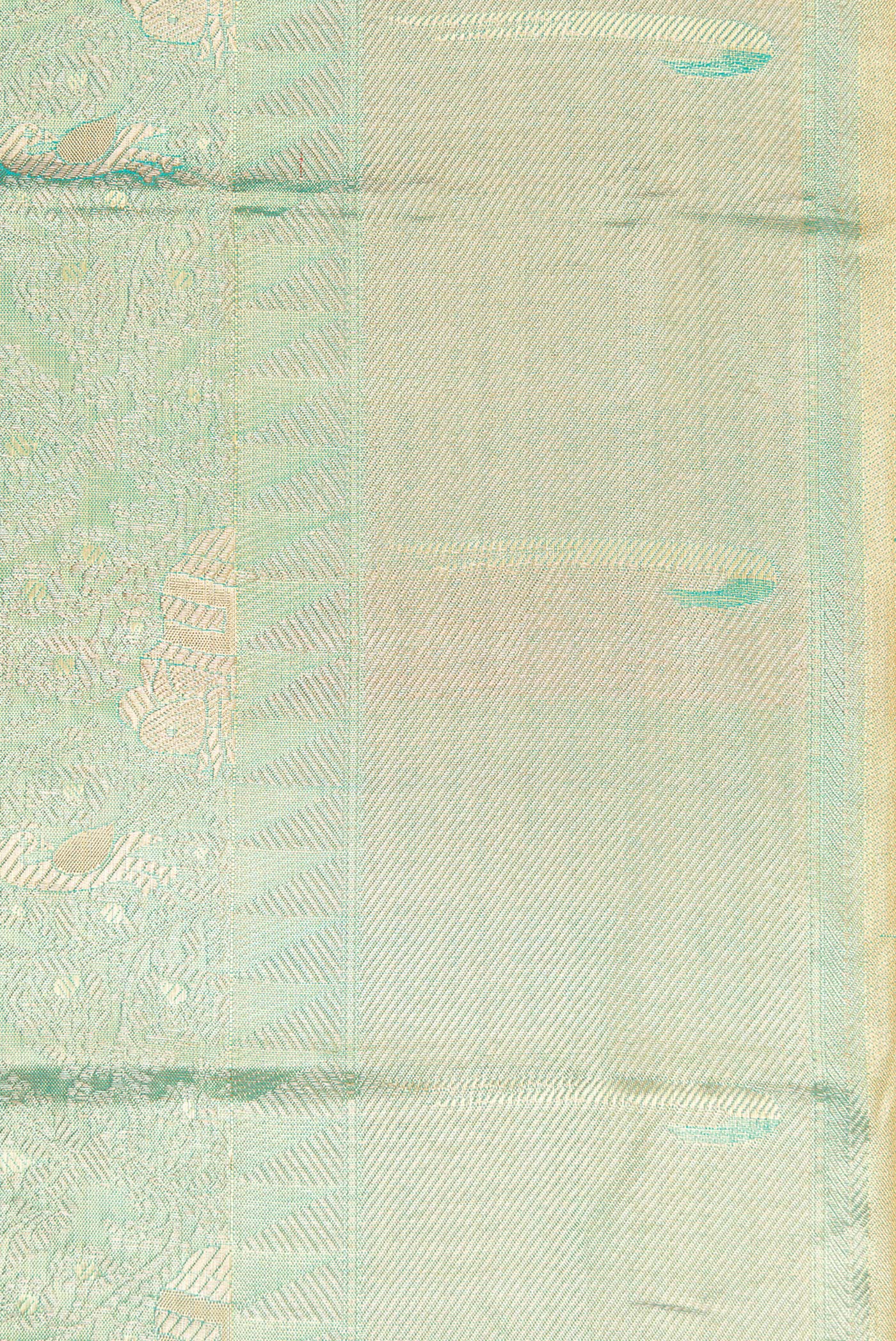 Border image of Sea Green Dual Tone Kanjivaram Tissue Silk Saree with Zari Brocade on the body and Zari Border. 