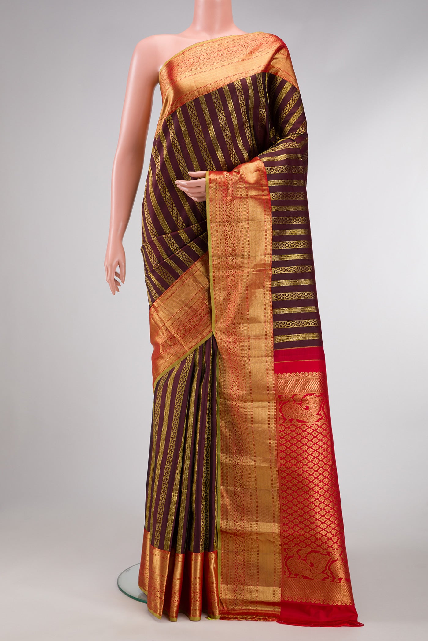 Coffee Brown Dual Tone Kanjivaram Silk Saree with Zari Brocade on the body and Zari Border.  displayed on a mannequin