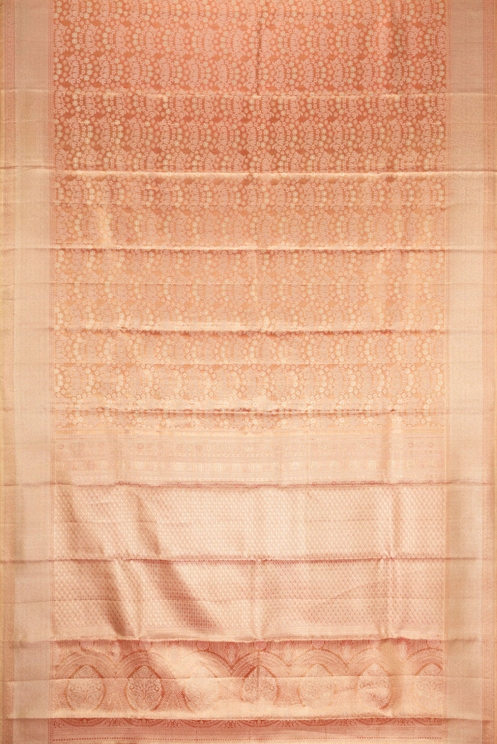 Flat view of Golden Peach Dual Tone Kanjivaram Tissue Silk Saree with Zari Brocade on the body and Zari Border. 