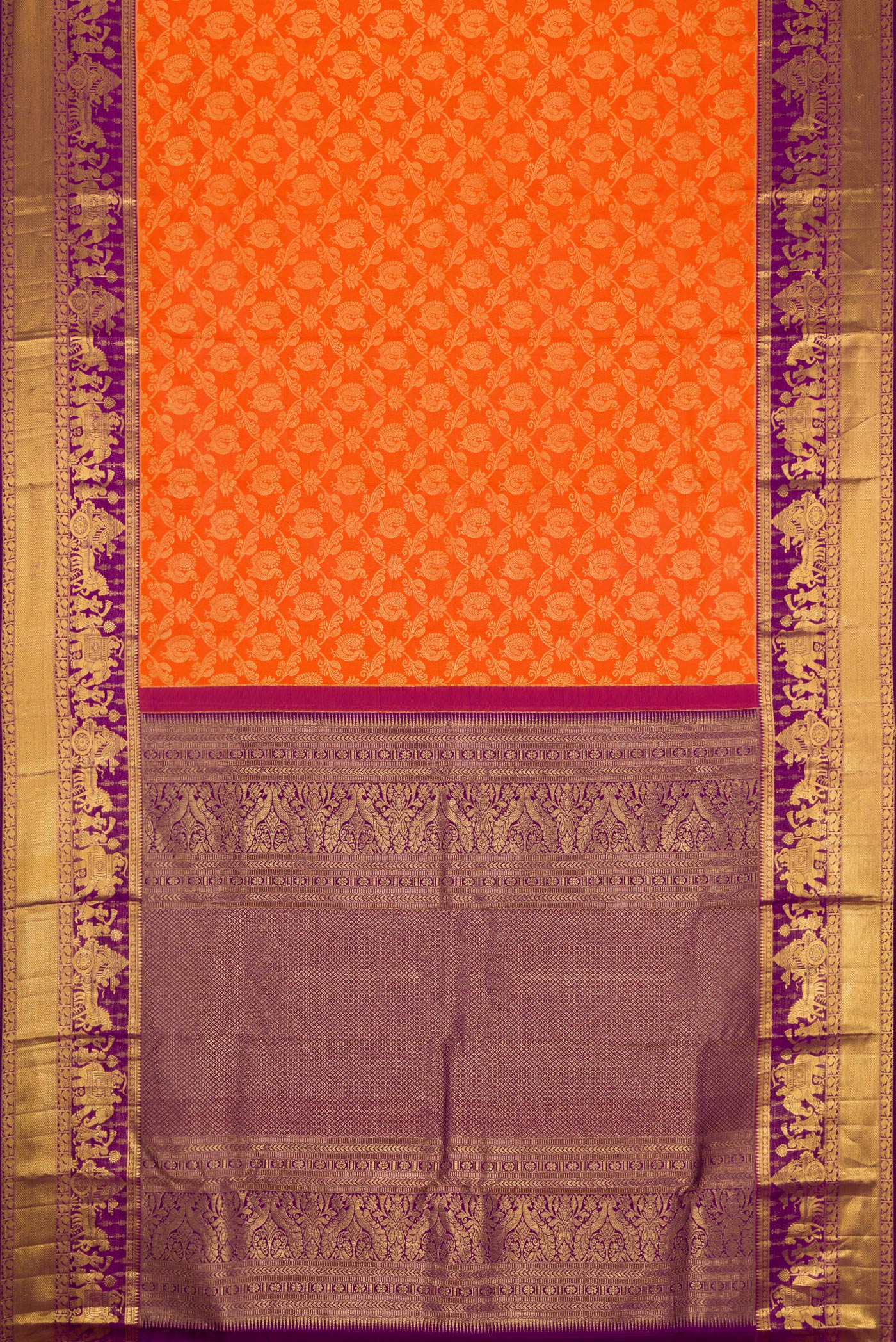 Flat view of Orange Dual Tone Kanchipuram Silk Saree with Zari Brocade on the body and Zari Border. 