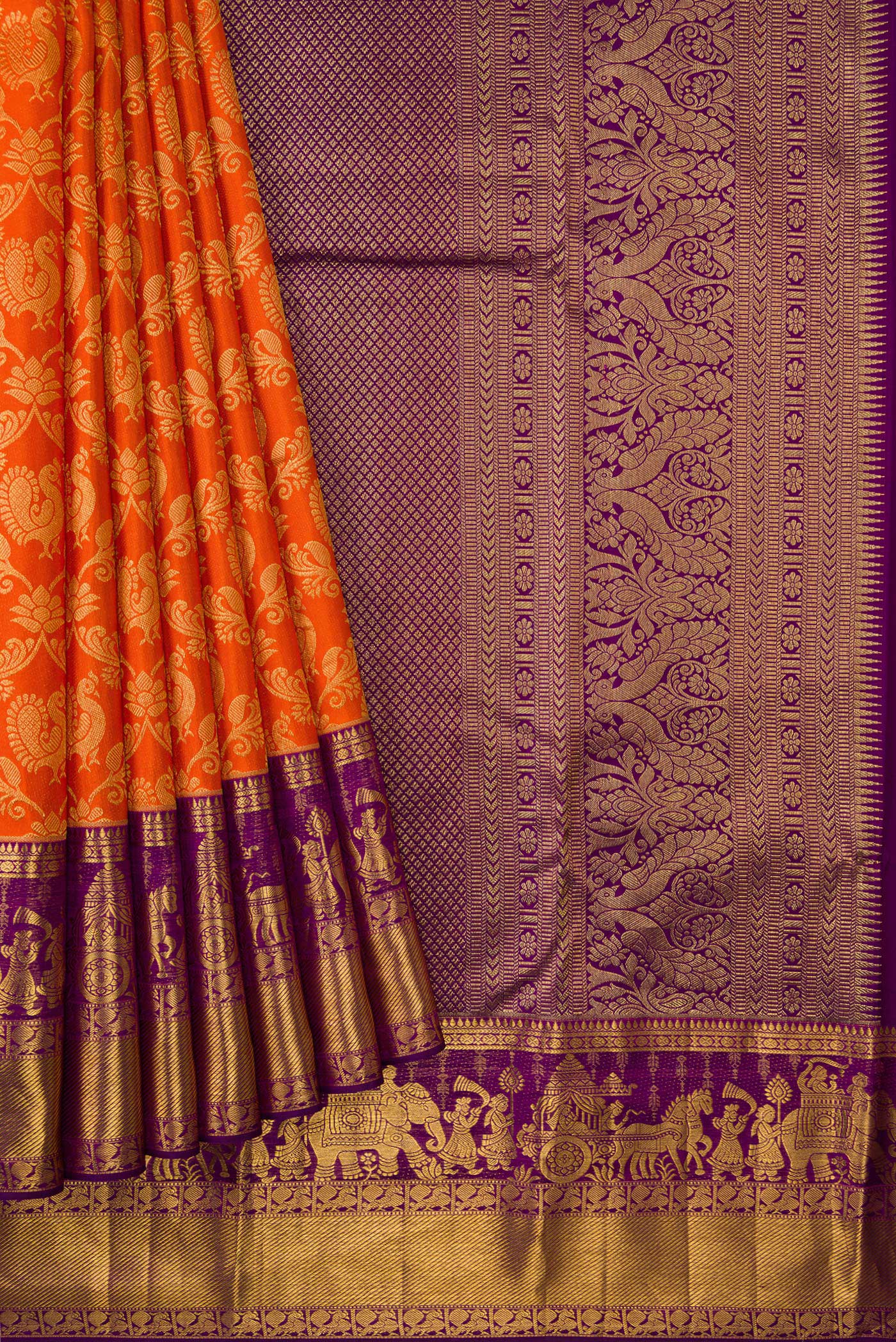 Pleats and pallu of Orange Dual Tone Kanchipuram Silk Saree with Zari Brocade on the body and Zari Border. 