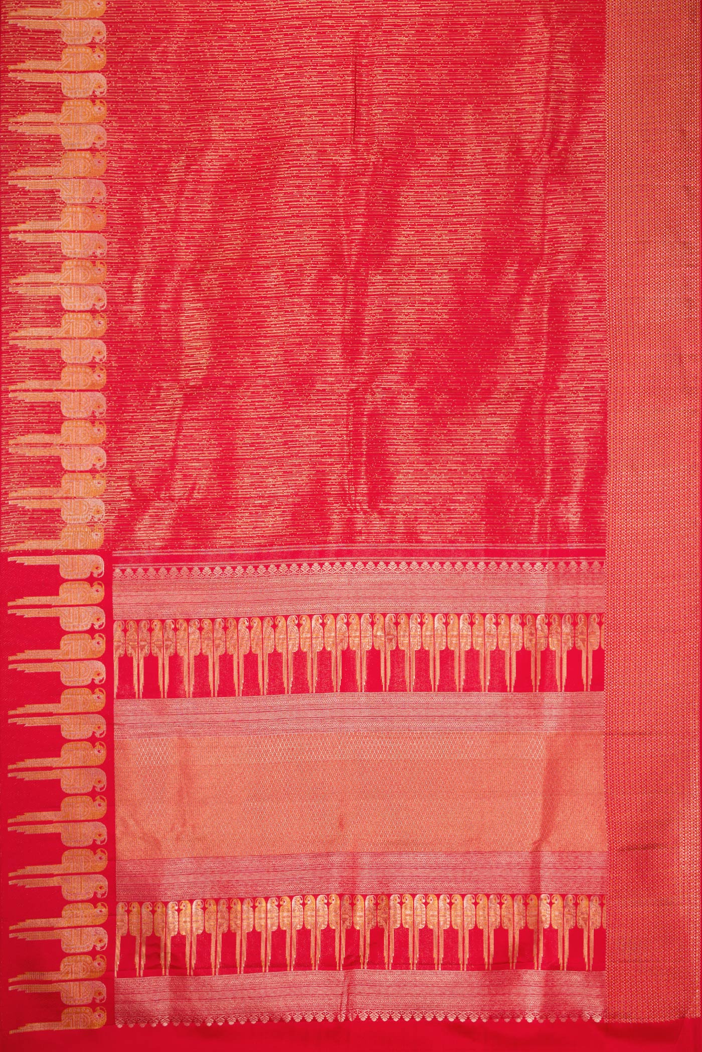 Flat view of Red Dual Tone Kanjivaram Silk Saree with Zari Brocade on the body and Fancy Border. 