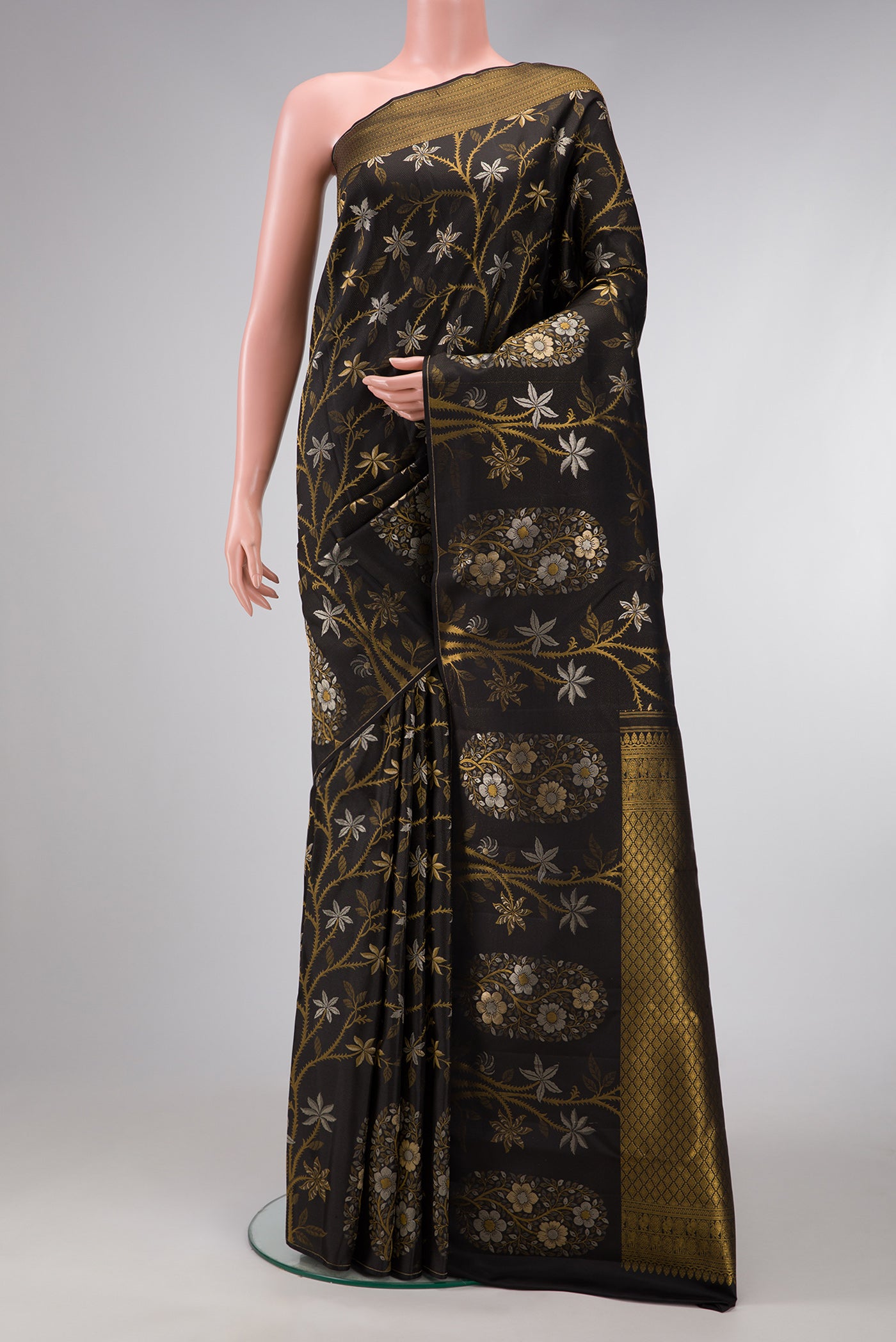 Black Dual Tone Kanjivaram Silk Saree with Zari Brocade on the body and Fancy Border.  displayed on a mannequin