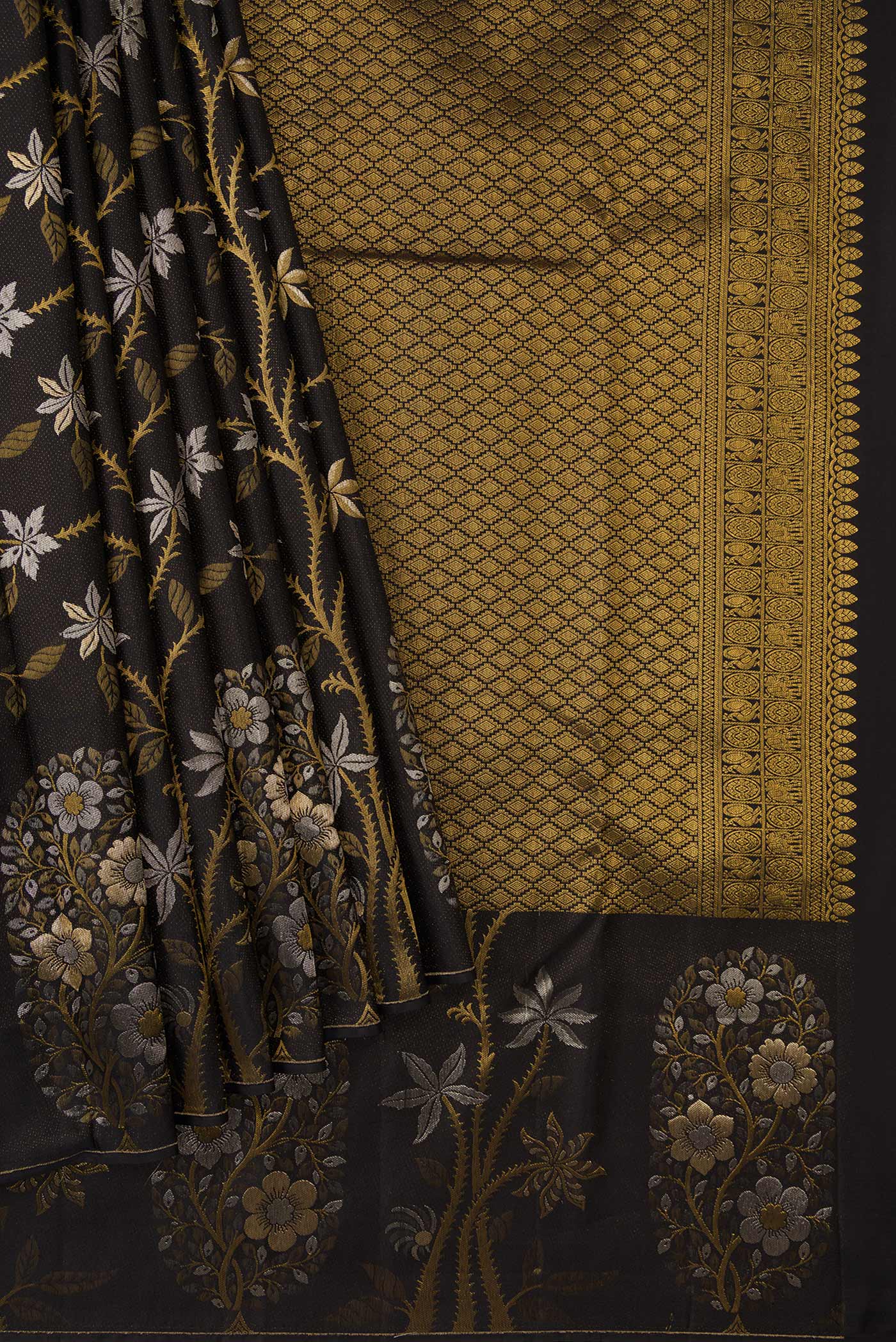 Pleats and pallu of Black Dual Tone Kanjivaram Silk Saree with Zari Brocade on the body and Fancy Border. 