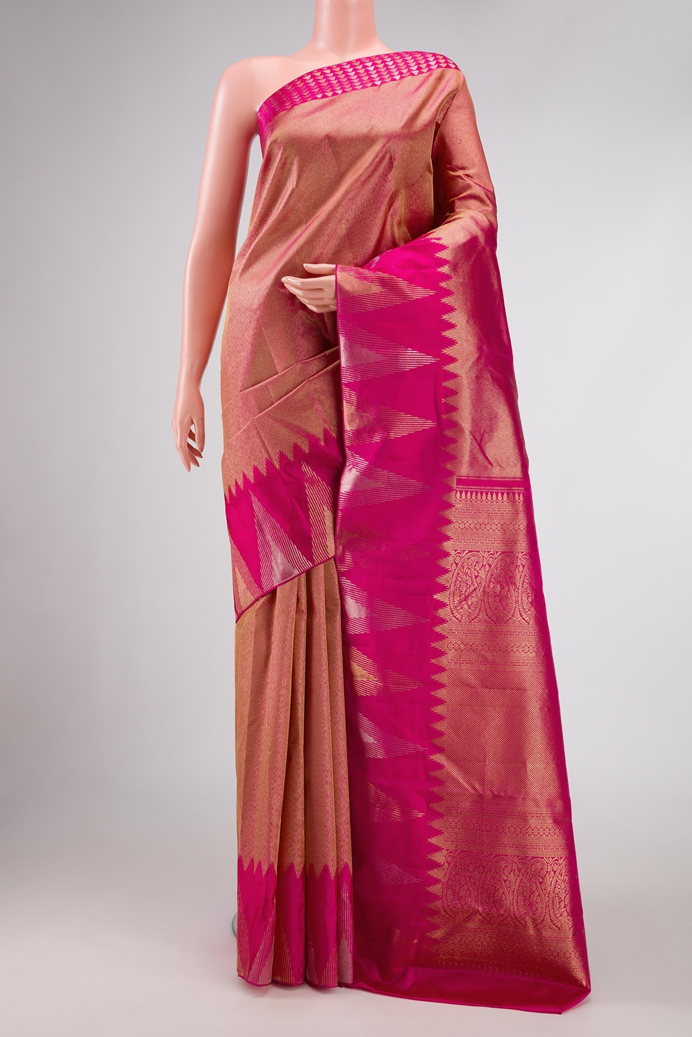 Pink Dual Tone Kanchipuram Silk Saree with Zari Brocade on the body and Fancy Border displayed on a mannequin