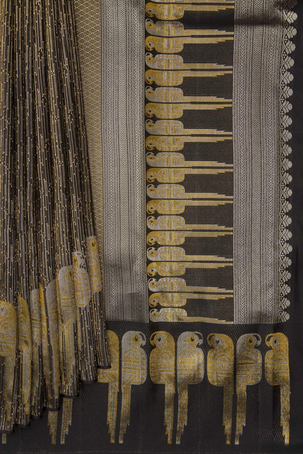 Pleats and pallu of Black Dual Tone Kanjivaram Silk Saree with Zari Brocade on the body and Fancy Border. 