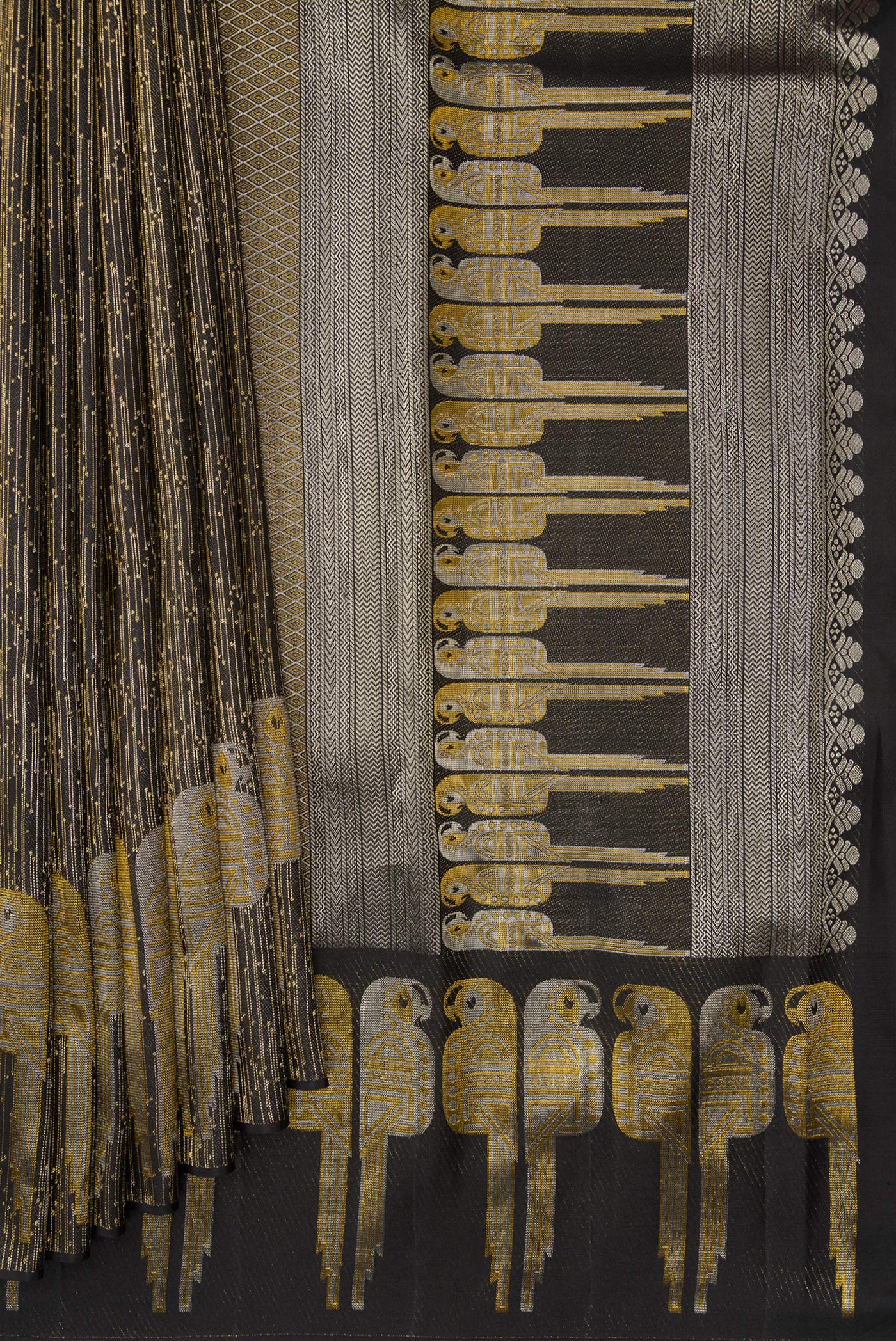 Pleats and pallu of Black Dual Tone Kanjivaram Silk Saree with Zari Brocade on the body and Fancy Border. 