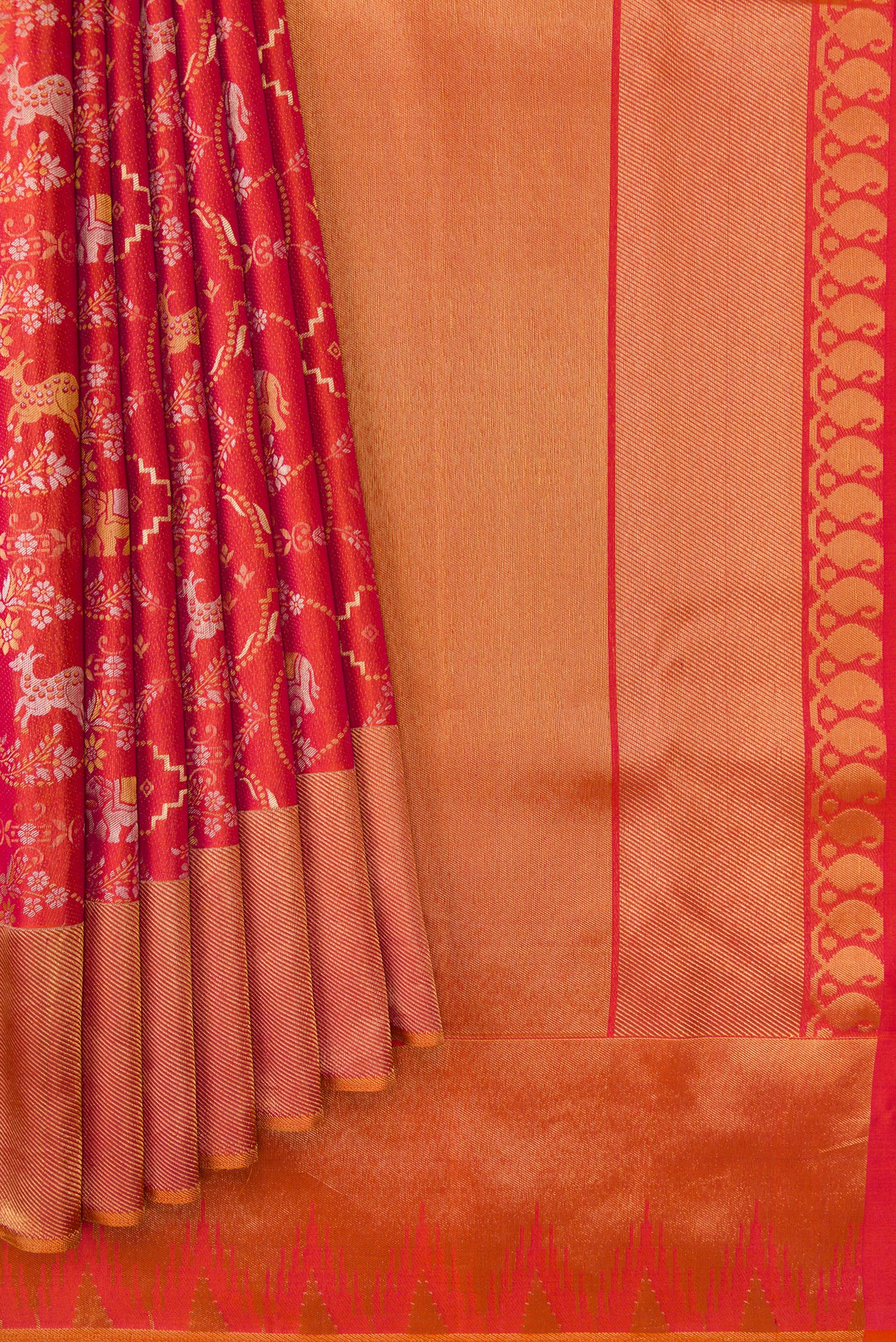 Pleats and pallu of Brick Orange Dual Tone Kanjivaram Silk Saree with Zari Brocade on the body and Zari Border. 