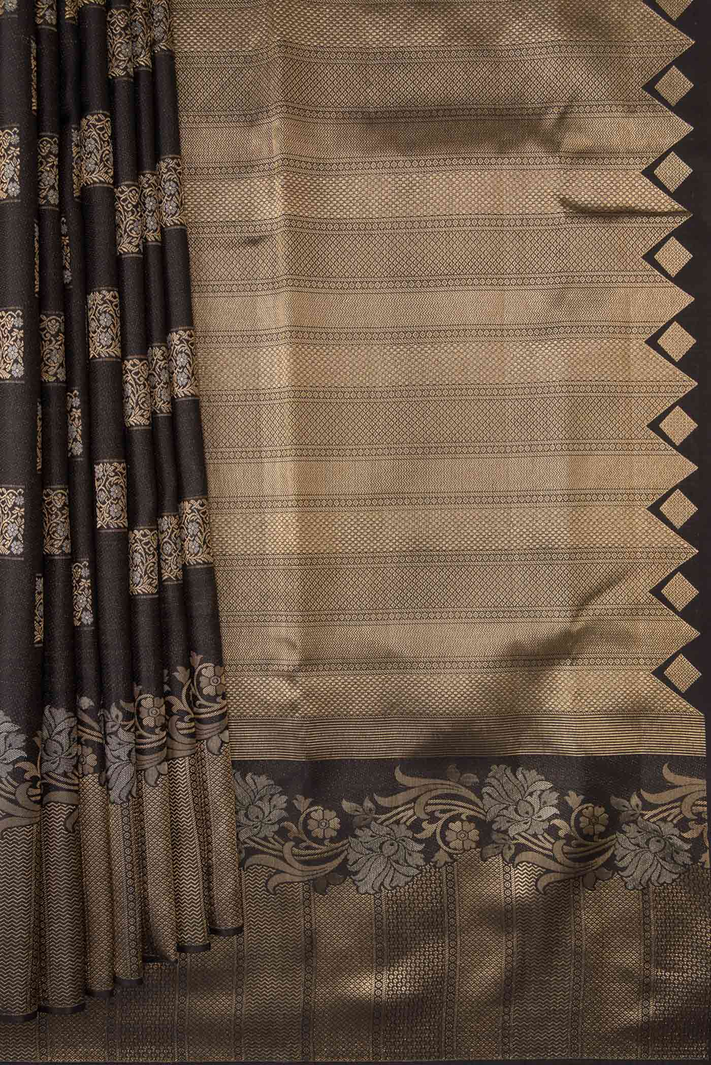 Pleats and pallu of Black Dual Tone Kanjivaram Silk Saree with Zari Butta on the body and Fancy Border. 