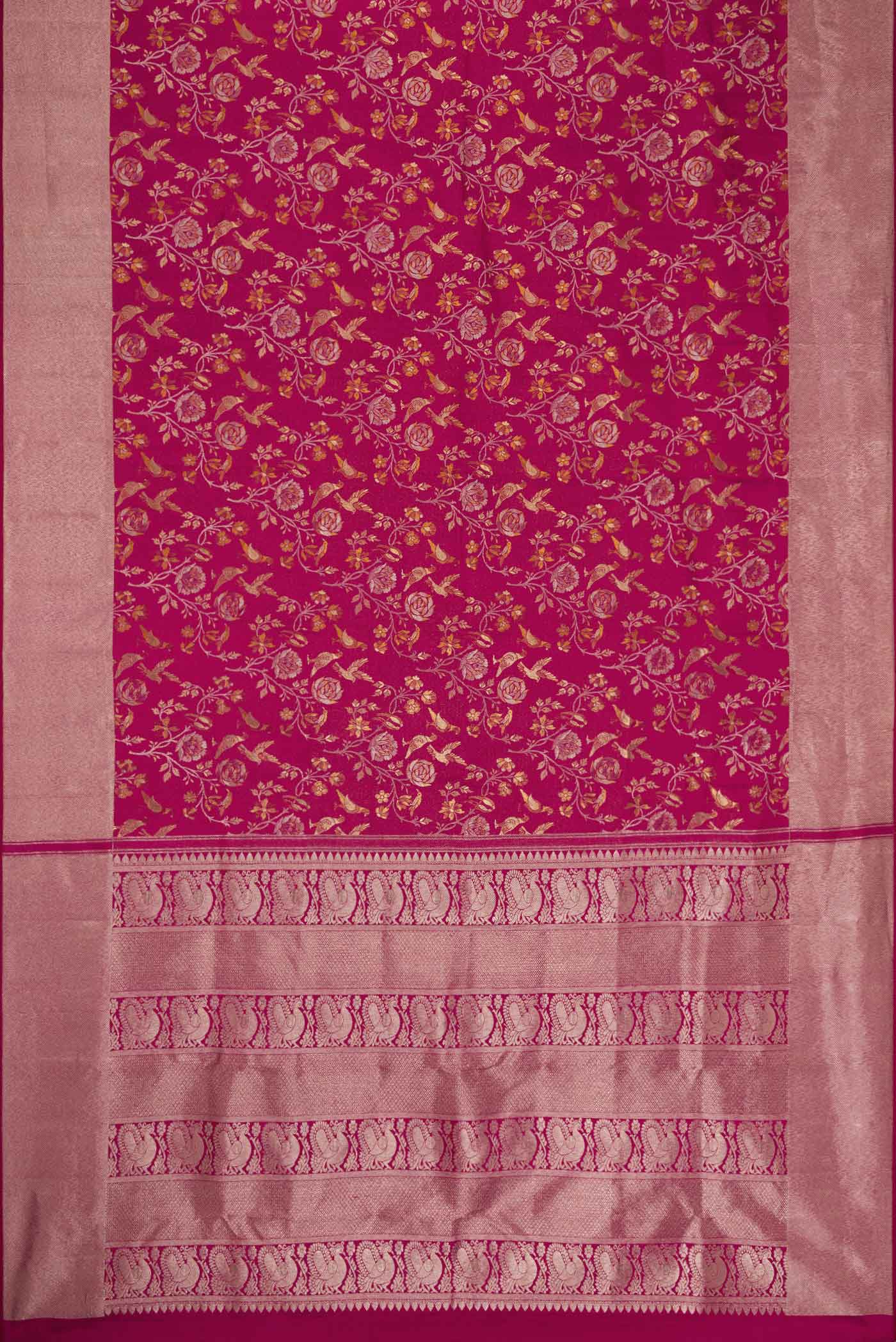 Flat view of Magenta Dual Tone Kanjivaram Silk Saree with Zari Brocade on the body and Zari Border. 