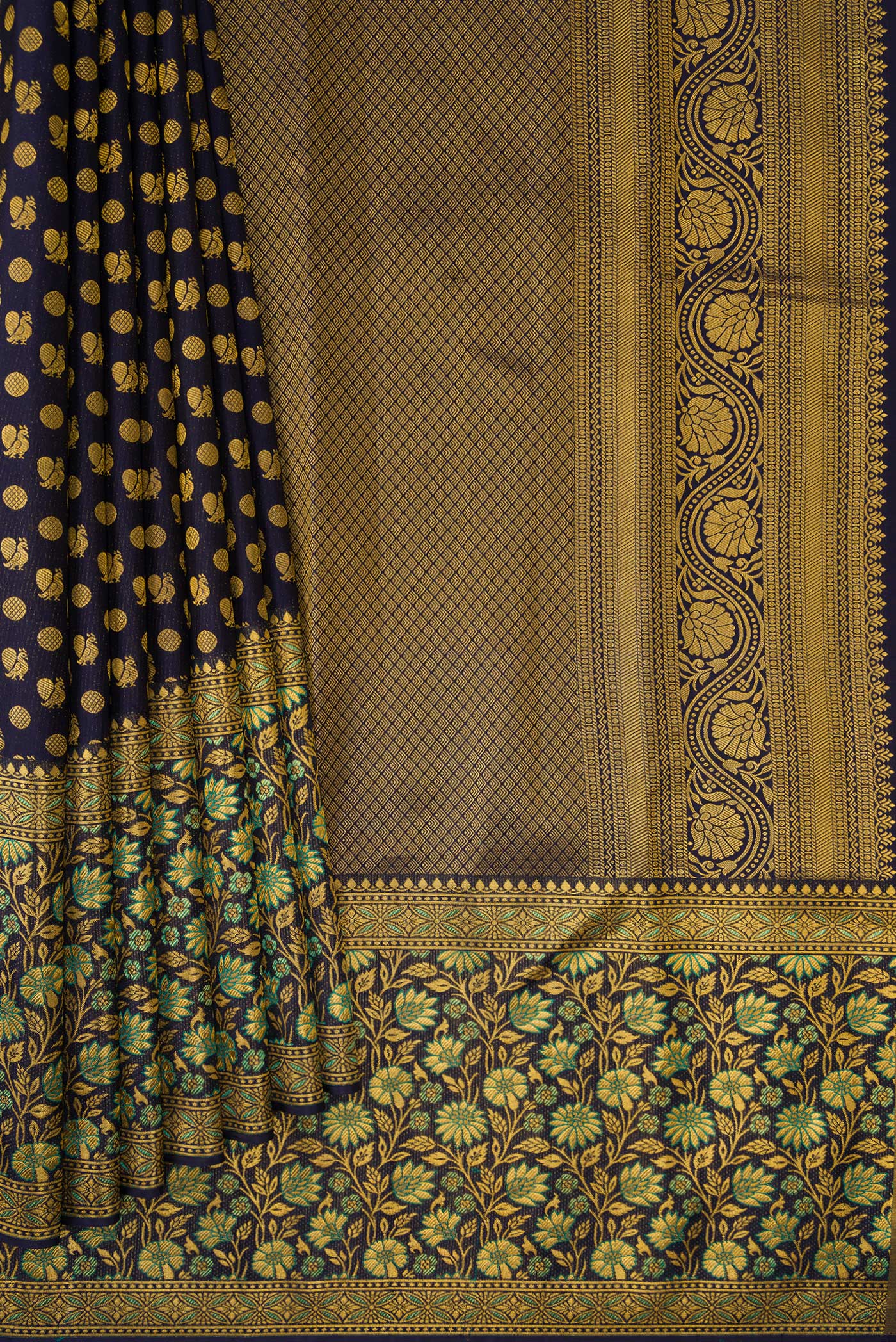 Pleats and pallu of Navy Blue Dual Tone Kanjivaram Silk Saree with Zari Brocade on the body and Fancy Border. 