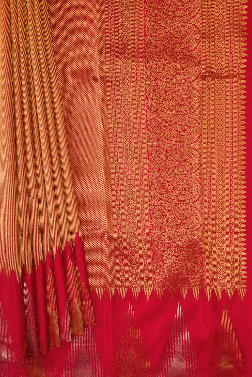 Pleats and pallu of Red Dual Tone Kanjivaram Silk Saree with Zari Brocade on the body and Temple Border. 