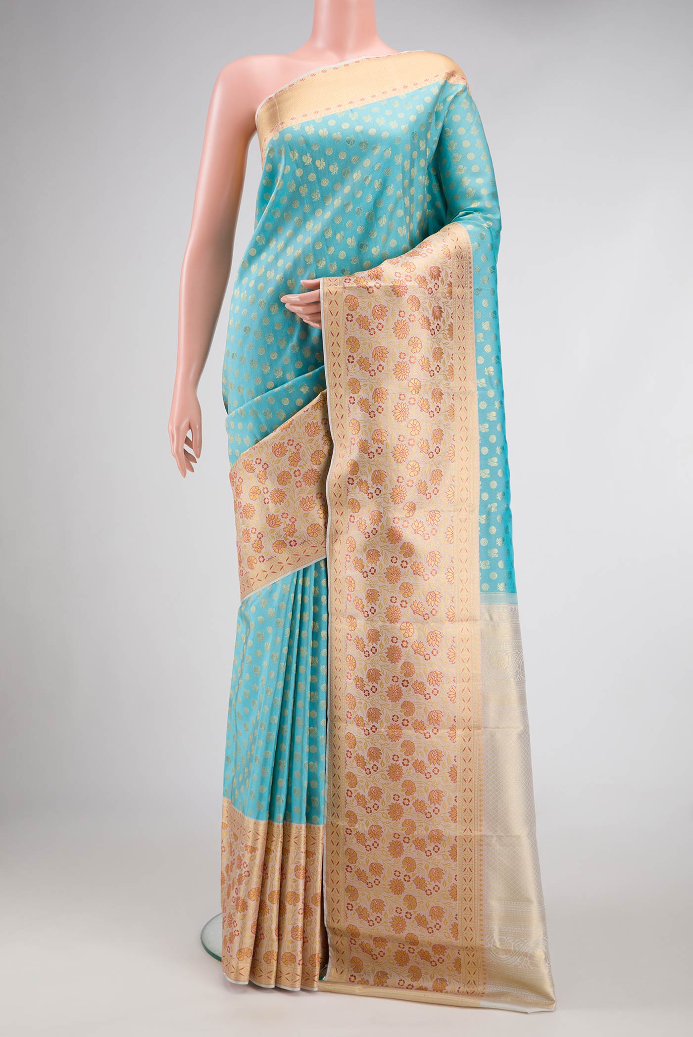 Sky Blue Dual Tone Kanjivaram Silk Saree with Zari Brocade on the body and Fancy Border.  displayed on a mannequin