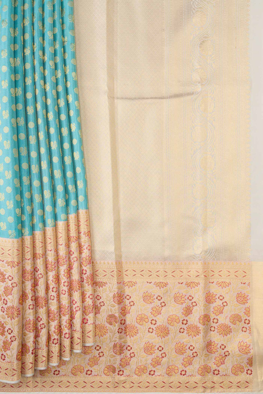 Pleats and pallu of Sky Blue Dual Tone Kanjivaram Silk Saree with Zari Brocade on the body and Fancy Border. 