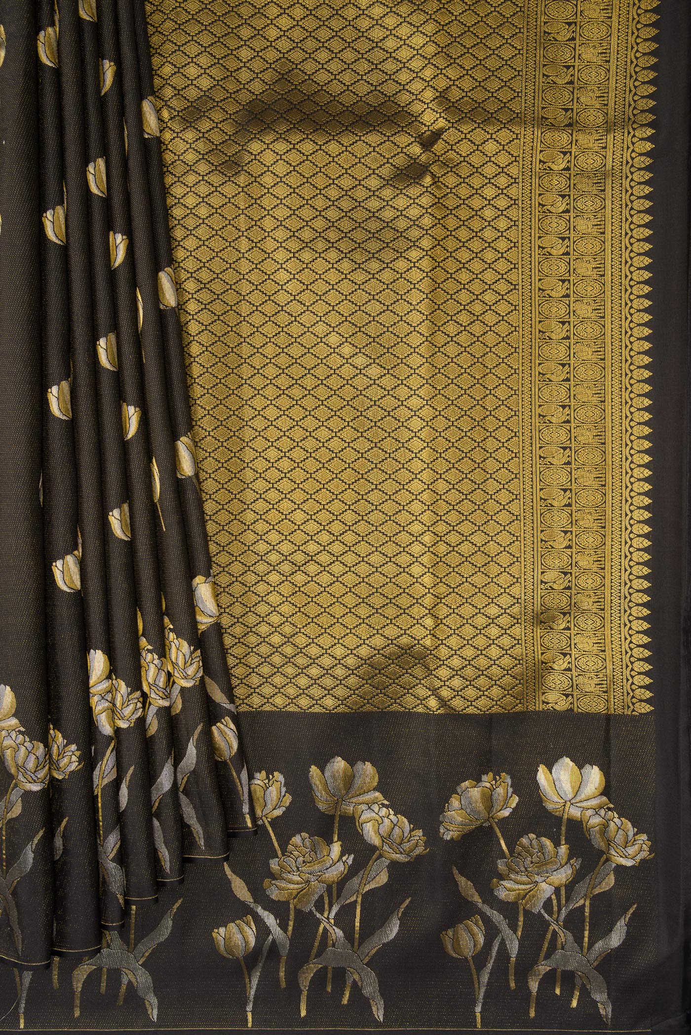 Pleats and pallu of Black Dual Tone Kanjivaram Silk Saree with Zari Butta on the body and Fancy Border. 