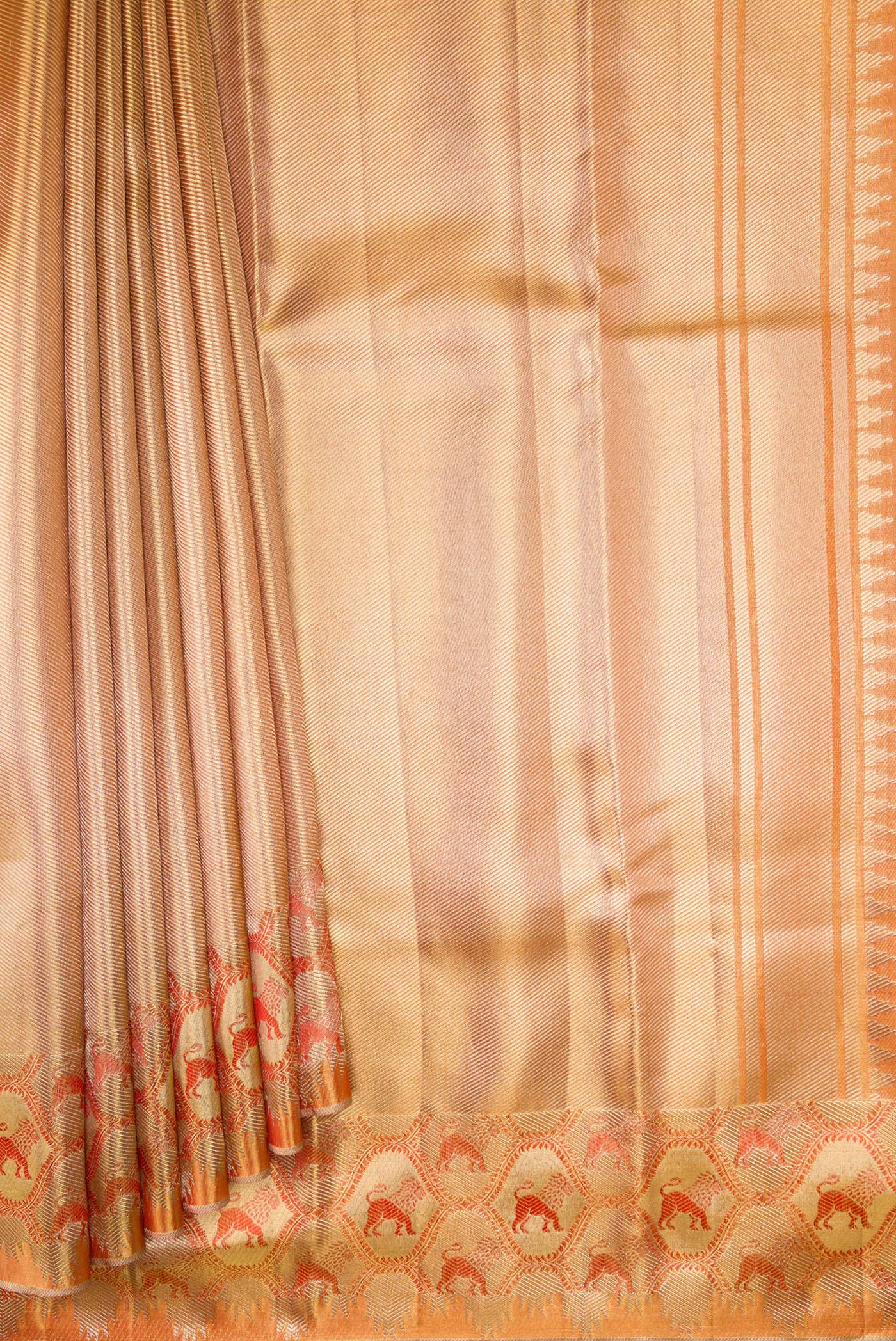 Pleats and pallu of Gold Dual Tone Kanchipuram Tissue Silk Saree with Zari Brocade on the body and Fancy Border. 
