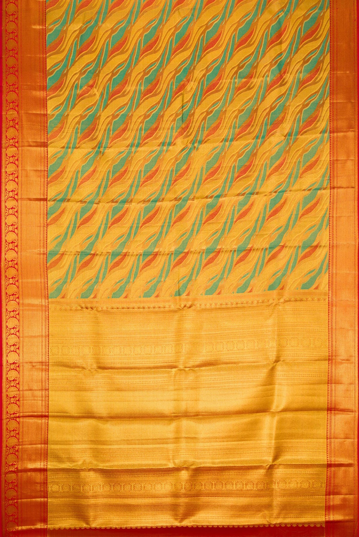 Flat view of Gold Dual Tone Kanjivaram Tissue Silk Saree with Zari Brocade on the body and Zari Border. 