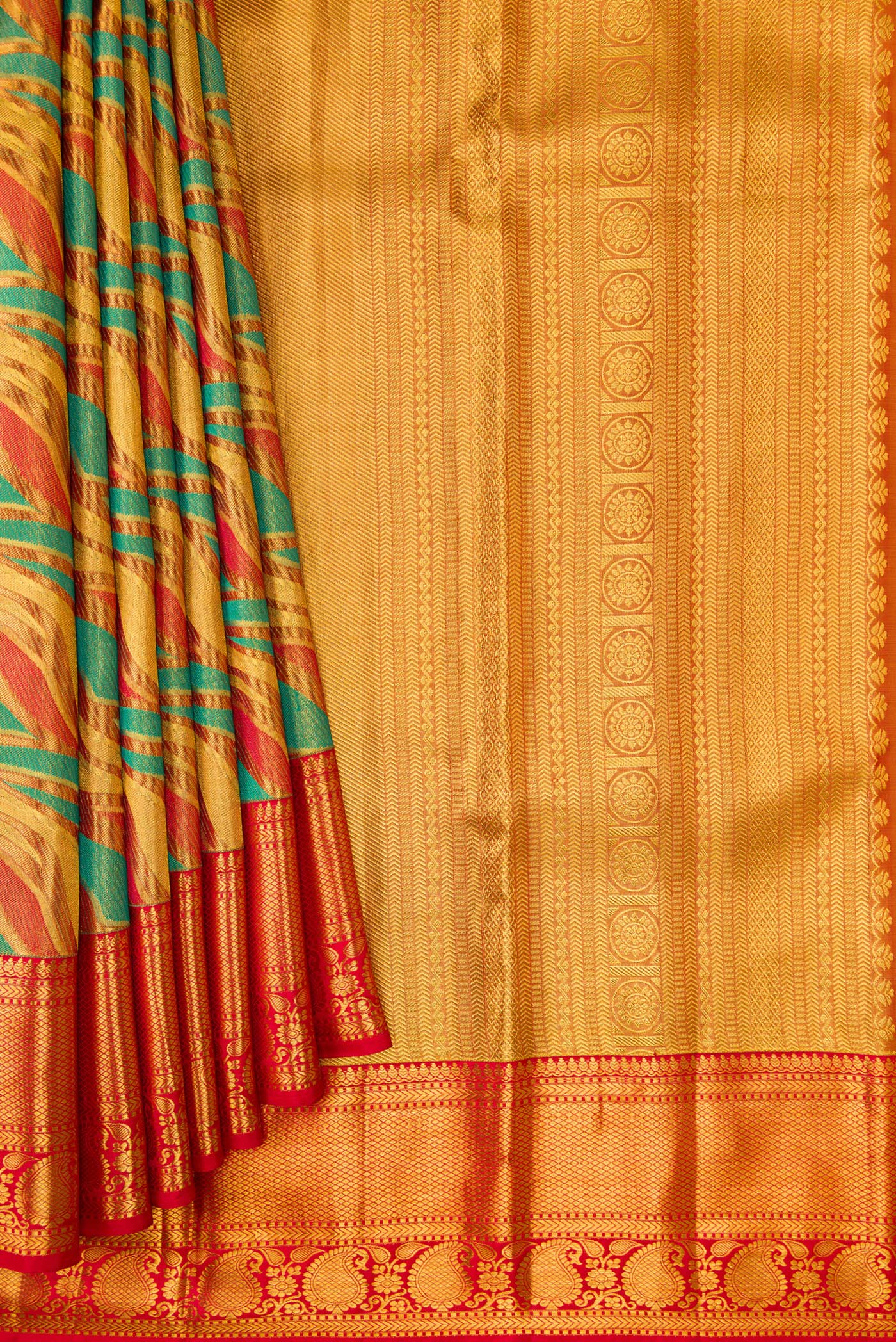 Pleats and pallu of Gold Dual Tone Kanjivaram Tissue Silk Saree with Zari Brocade on the body and Zari Border. 