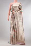 Lavender Dual Tone Kanjivaram Tissue Silk Saree with Zari Brocade on the body and Zari Border.  displayed on a mannequin