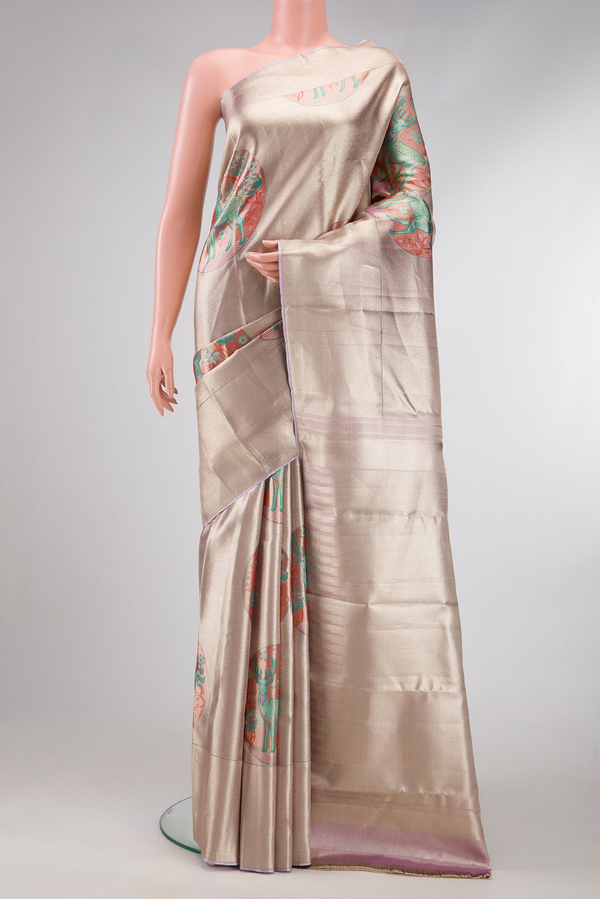 Lavender Dual Tone Kanjivaram Tissue Silk Saree with Zari Brocade on the body and Zari Border.  displayed on a mannequin
