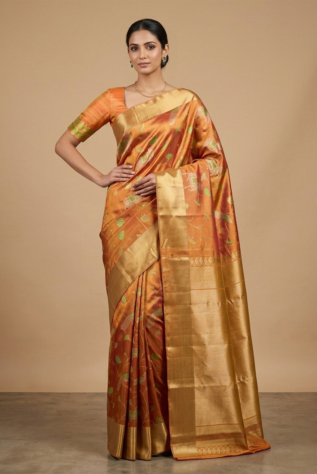 Model wearing a Mustard with Gold Color Kanchipuram Tissue Silk Saree with Zari Brocade on the body and Zari Border.