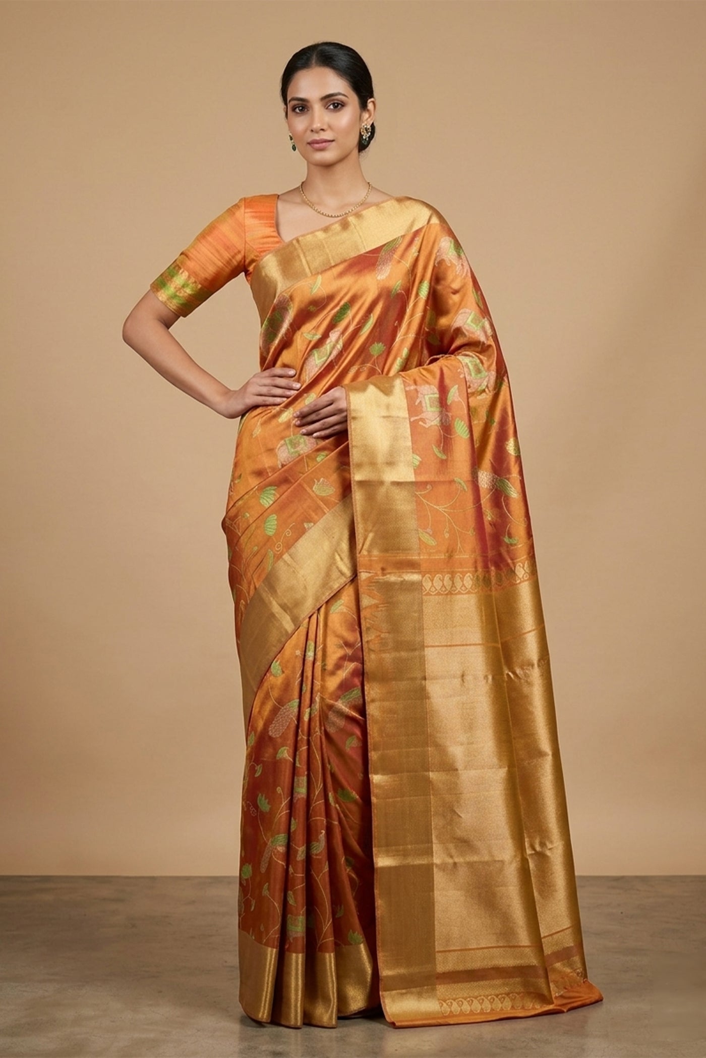 Model wearing a Mustard with Gold Color Kanchipuram Tissue Silk Saree with Zari Brocade on the body and Zari Border.