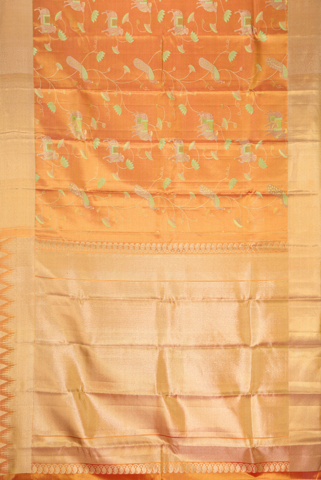 Flat view of Gold Dual Tone Kanjivaram Tissue Silk Saree with Zari Brocade on the body and Zari Border. 