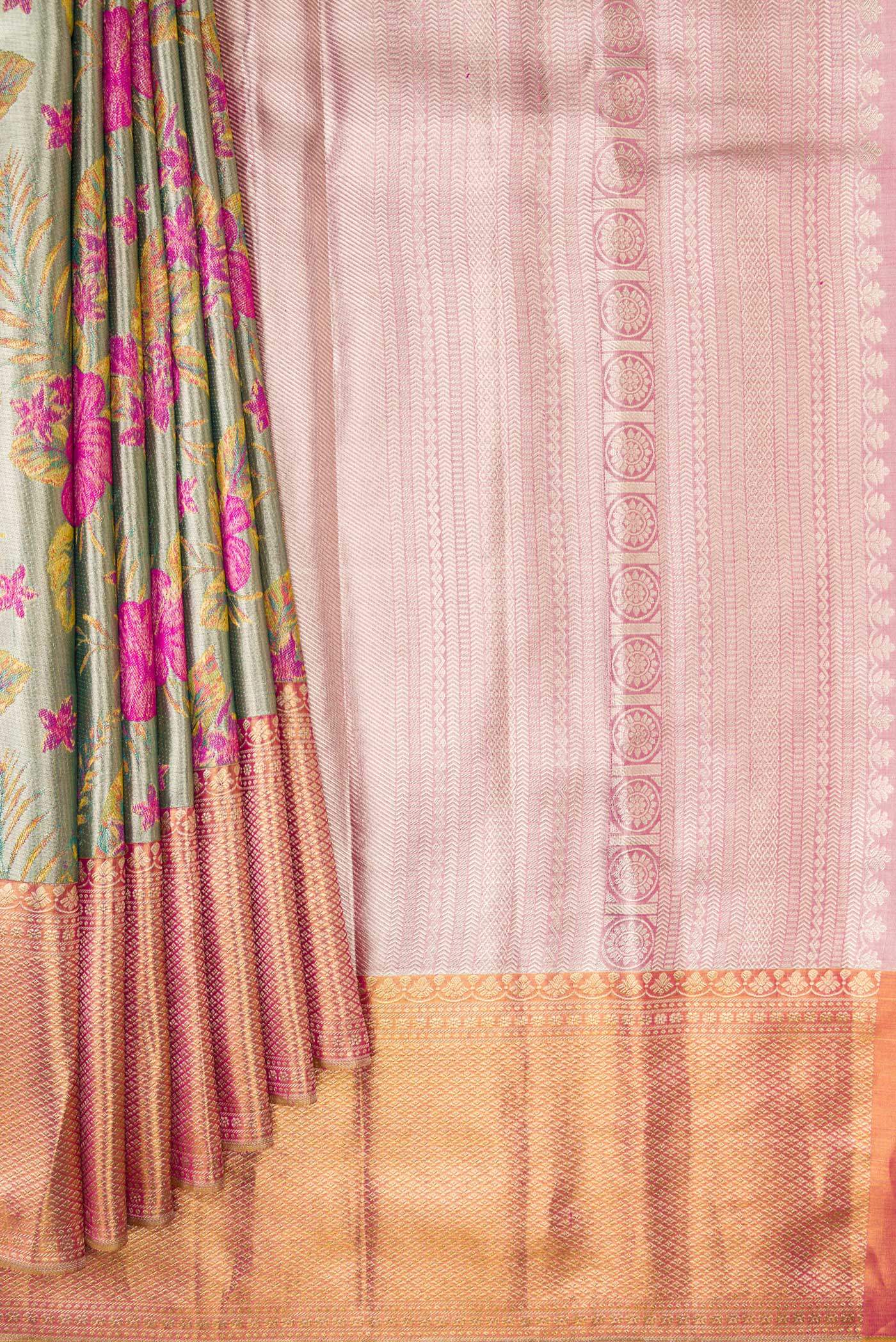Pleats and pallu of Green Dual Tone Kanjivaram Tissue Silk Saree with Zari Brocade on the body and Zari Border. 