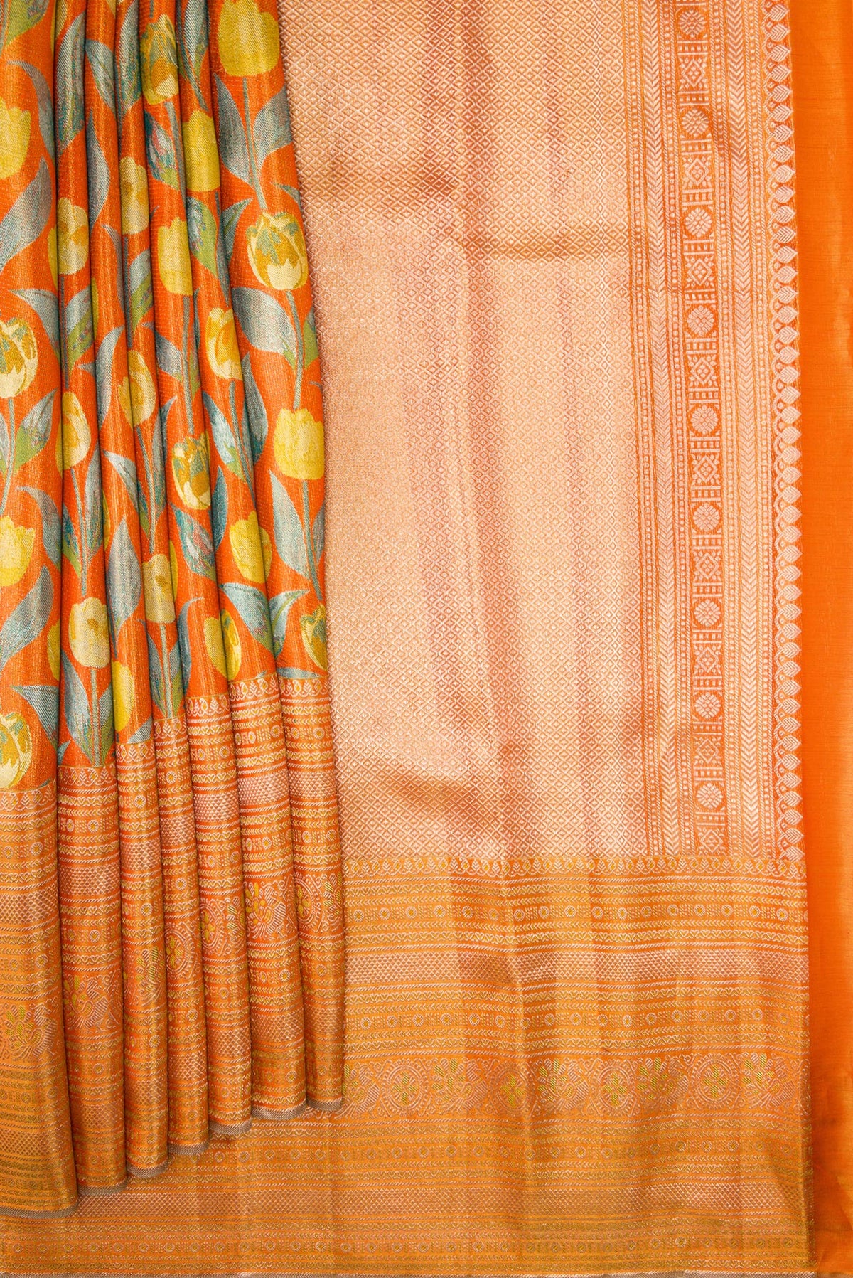Pleats and pallu of Orange Dual Tone Kanjivaram Tissue Silk Saree with Zari Brocade on the body and Zari Border. 