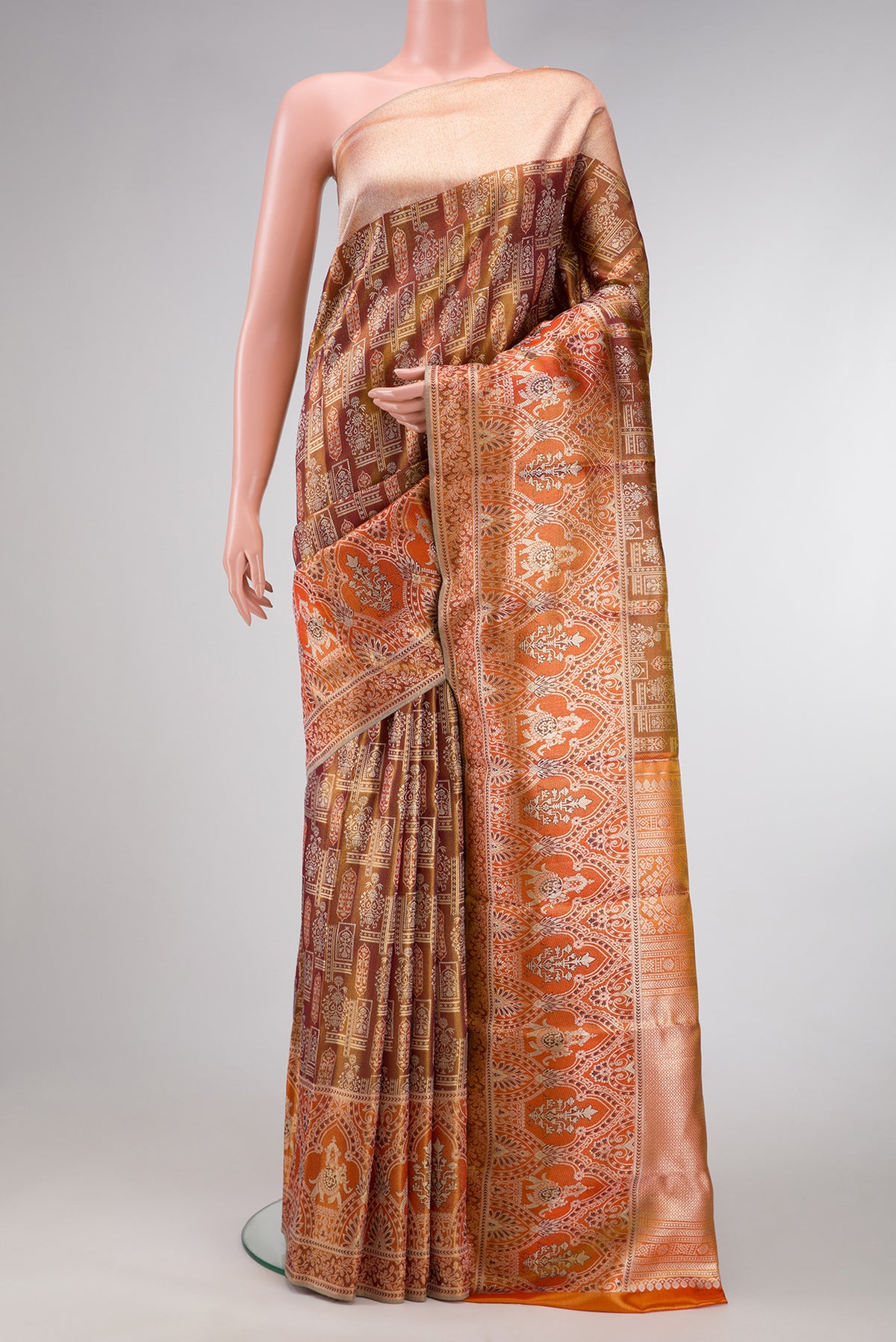 Brown Dual Tone Kanjivaram Tissue Silk Saree with Zari Brocade on the body and Fancy Border.  displayed on a mannequin