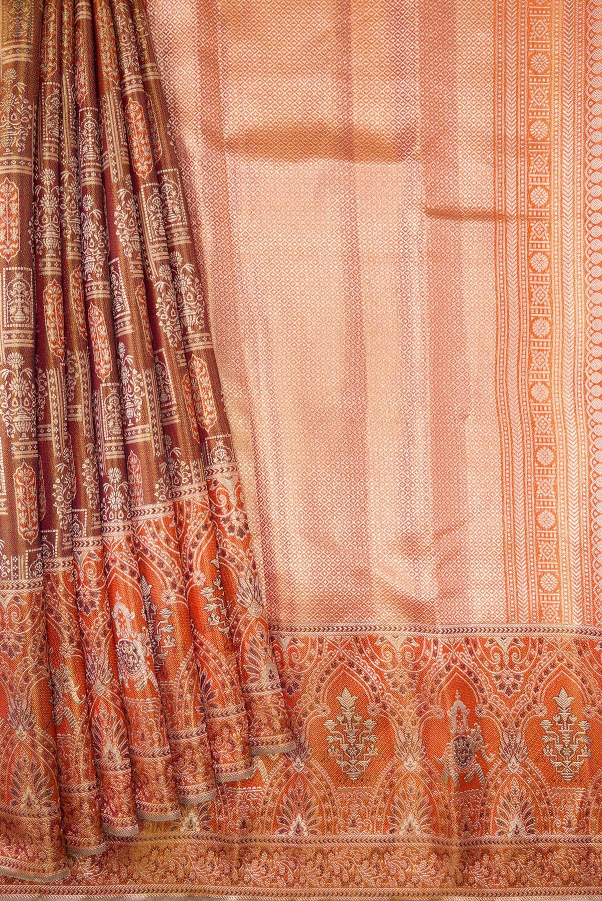 Pleats and pallu of Brown Dual Tone Kanjivaram Tissue Silk Saree with Zari Brocade on the body and Fancy Border. 
