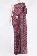 Purple Printed Silk Saree with Printed design on the body and Printed Border.  displayed on a mannequin