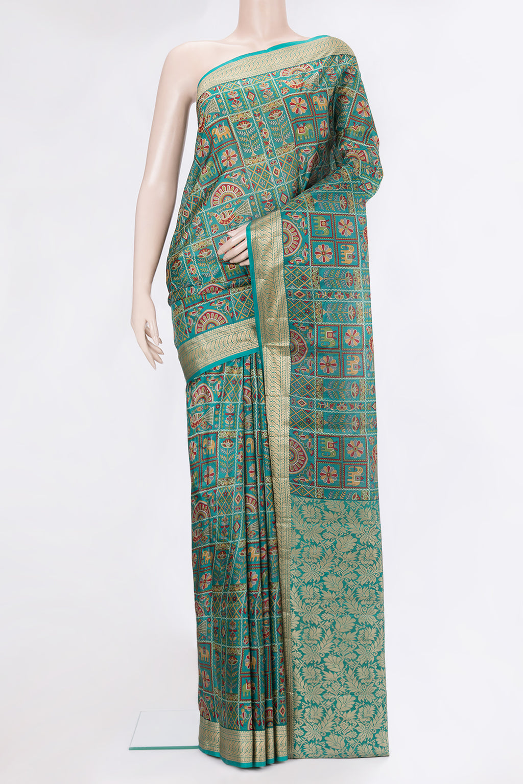 Green Dual Tone Tussar Silk Saree with Printed design on the body and Thread Border.  displayed on a mannequin