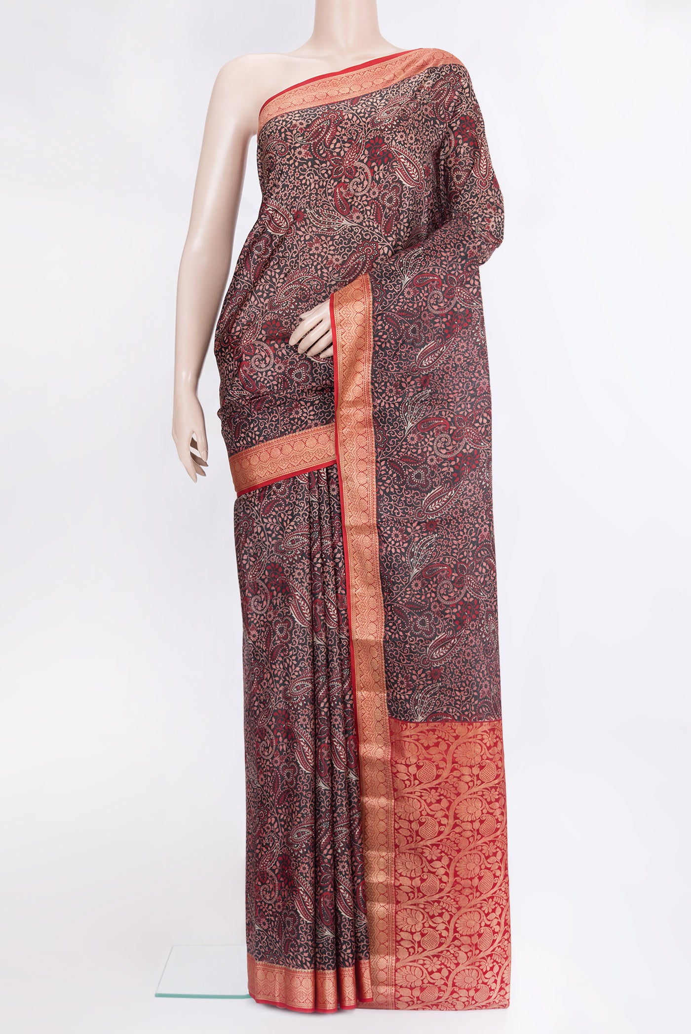 Black Printed Silk Saree with Printed design on the body and Thread Border.  displayed on a mannequin