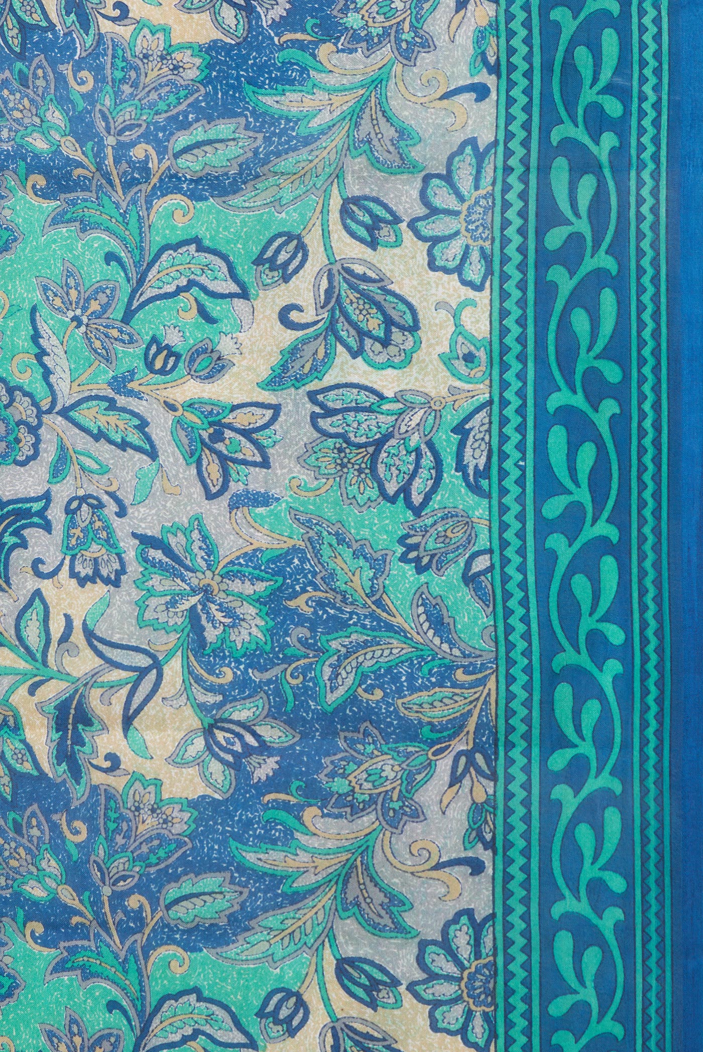 Border image of Peacock Blue Dual Tone Tussar Silk Saree with Printed design on the body and Printed Border. 