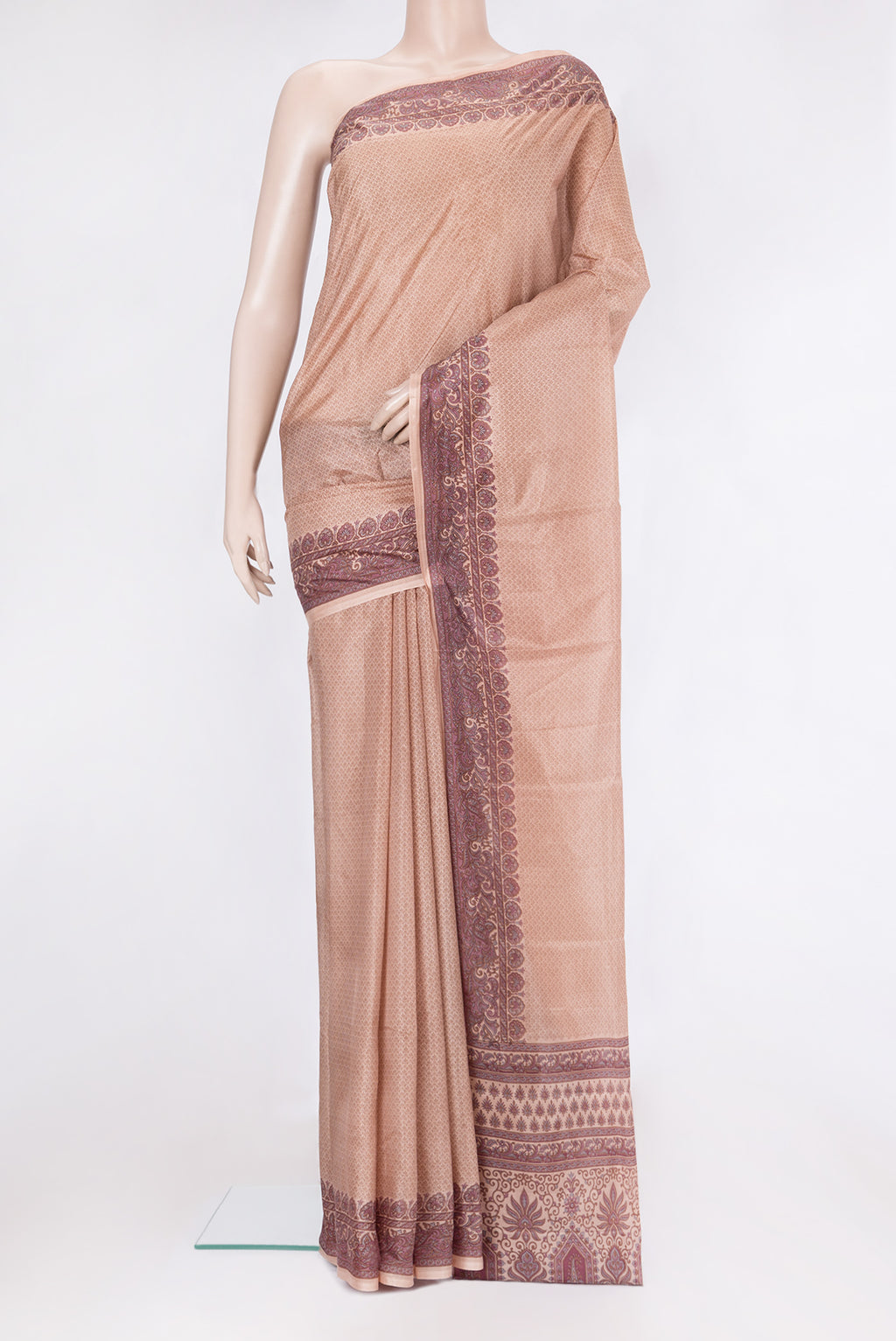 Golden Peach Printed Silk Saree with Printed design on the body and Printed Border.  displayed on a mannequin