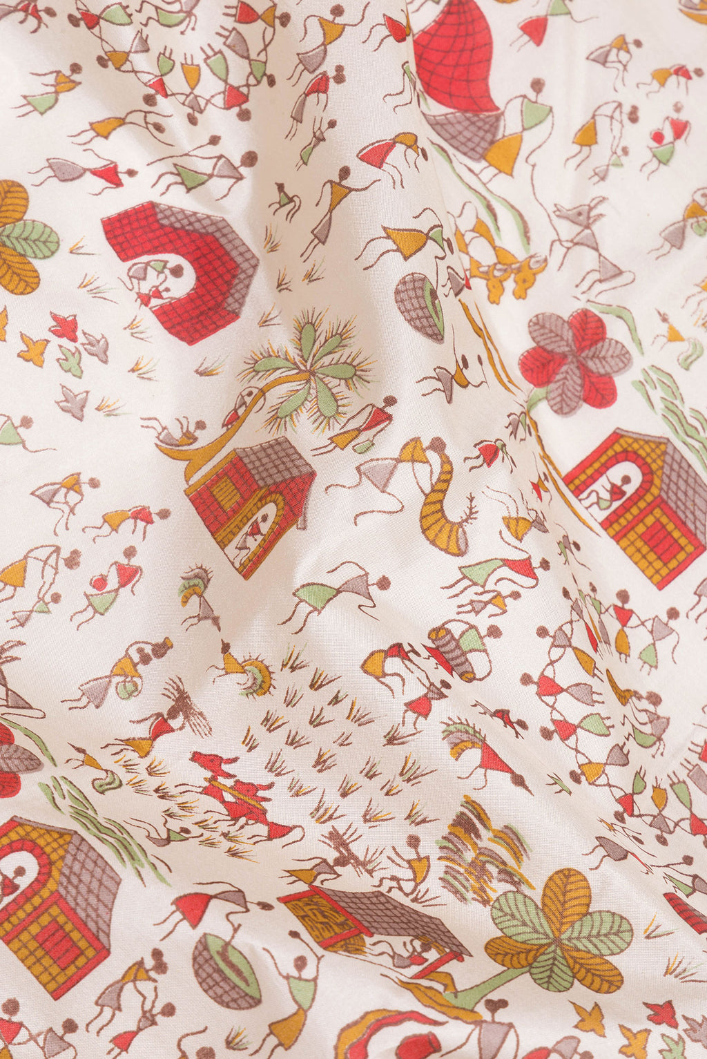 Close up of Off White Printed Silk Saree with Printed design on the body and Printed Border.  displaying folds