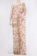 Off White Printed Silk Saree with Printed design on the body and Printed Border.  displayed on a mannequin