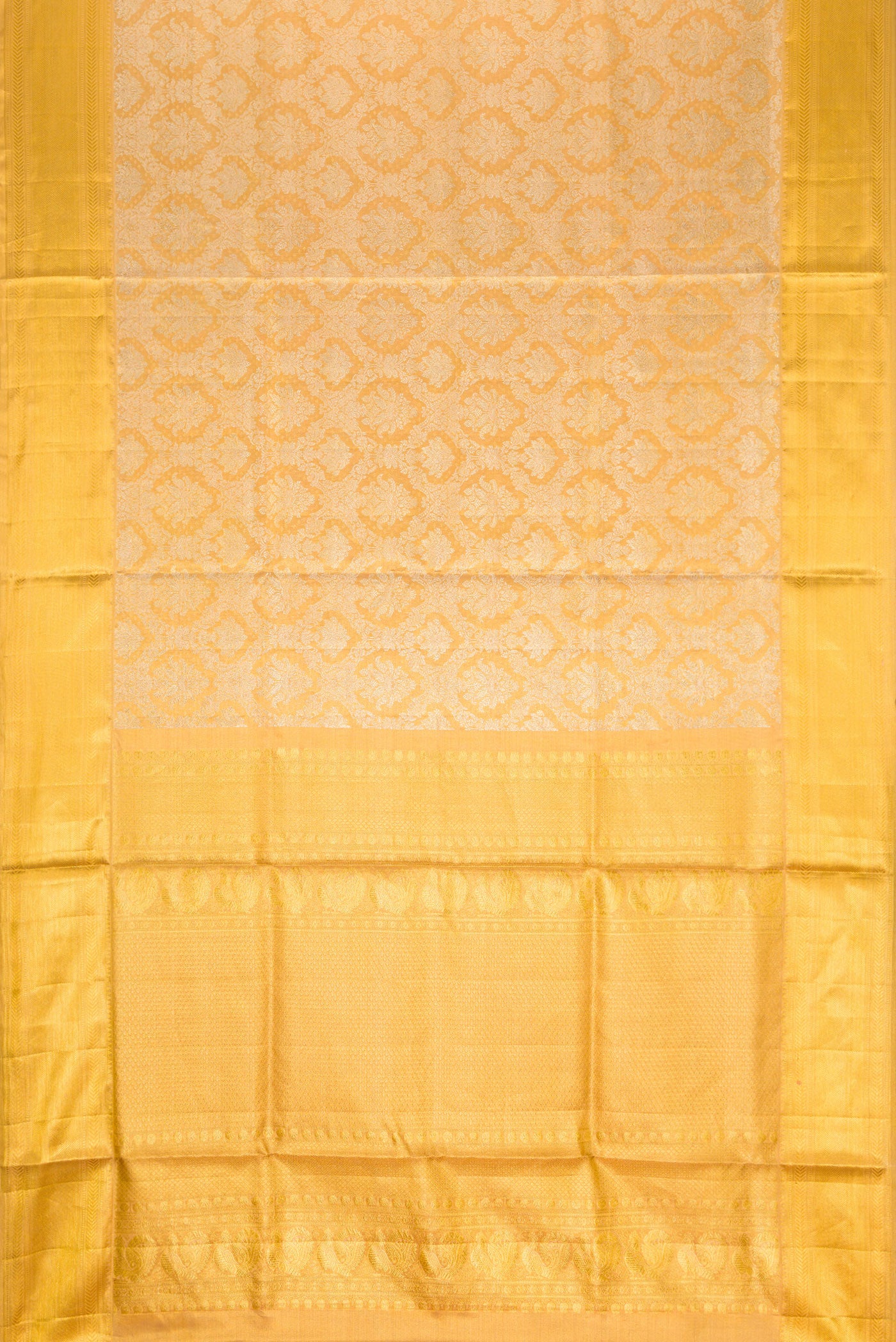 Flat view of Gold Dual Tone Kanjivaram Tissue Silk Saree with Zari Brocade on the body and Zari Border. 