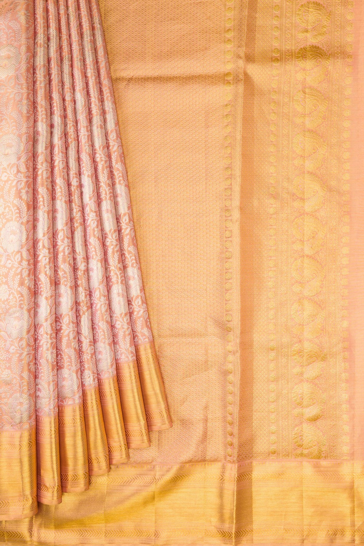 Pleats and pallu of Rose Gold Dual Tone Kanjivaram Tissue Silk Saree with Zari Brocade on the body and Zari Border. 