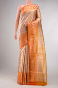 Gold Dual Tone Kanchipuram Silk Saree with Zari Brocade on the body and Zari Border displayed on a mannequin