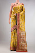 Mustard Dual Tone Kanchipuram Tissue Silk Saree with Zari Brocade on the body and Zari Border displayed on a mannequin