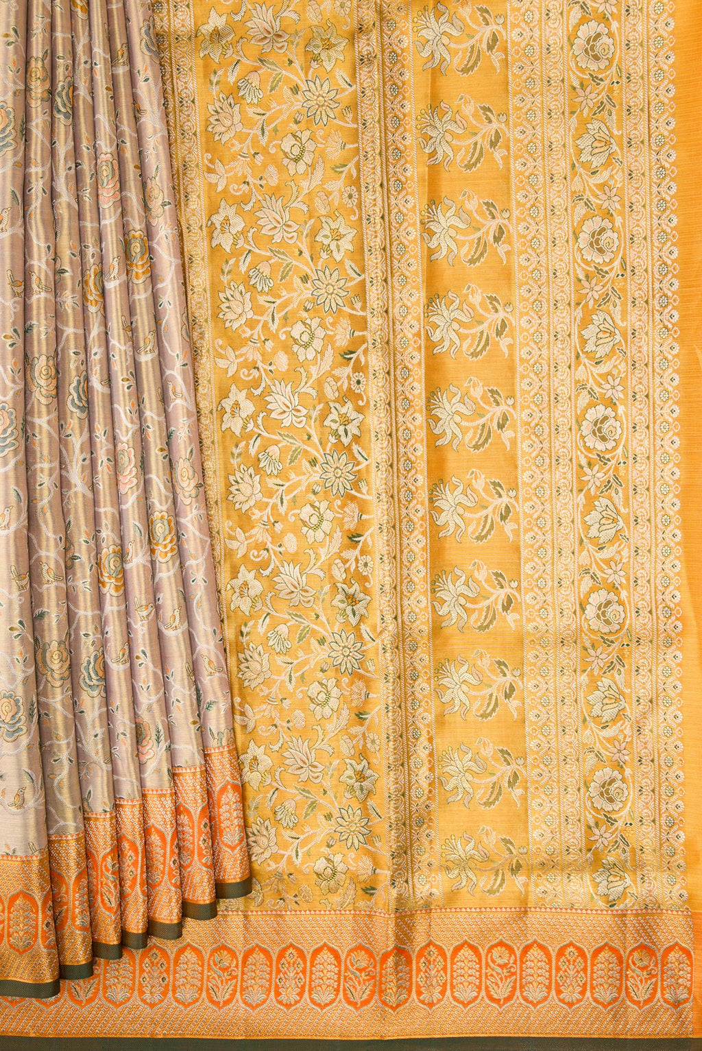 Pleats and pallu of Gold Dual Tone Kanchipuram Tissue Silk Saree with Zari Brocade on the body and Zari Border. 