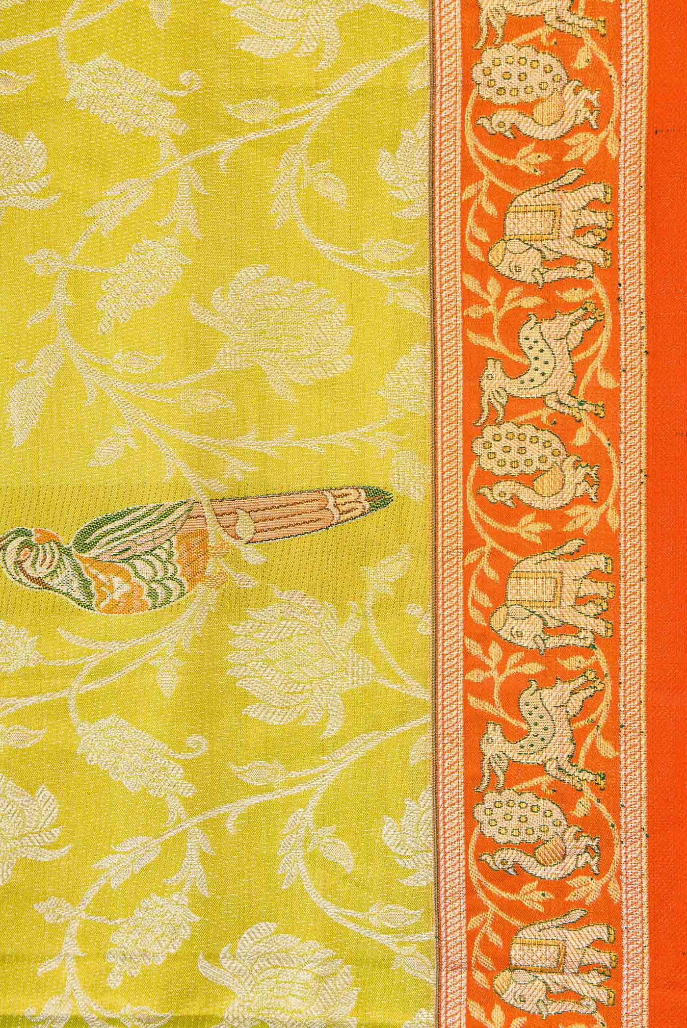 Border image of Parrot Green Dual Tone Kanchipuram Tissue Silk Saree with Zari Brocade on the body and Zari Border