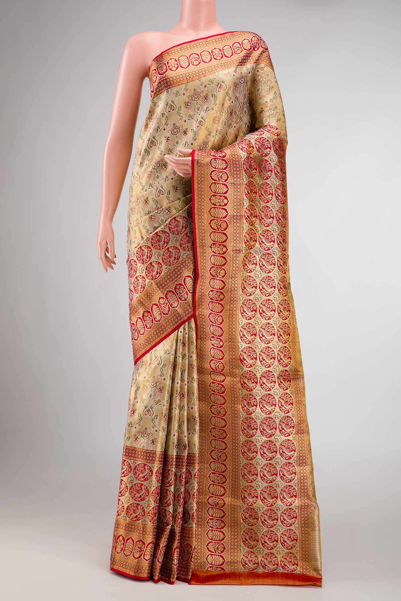 Gold Dual Tone Kanchipuram Tissue Silk Saree with Zari Brocade on the body and Zari Border displayed on a mannequin