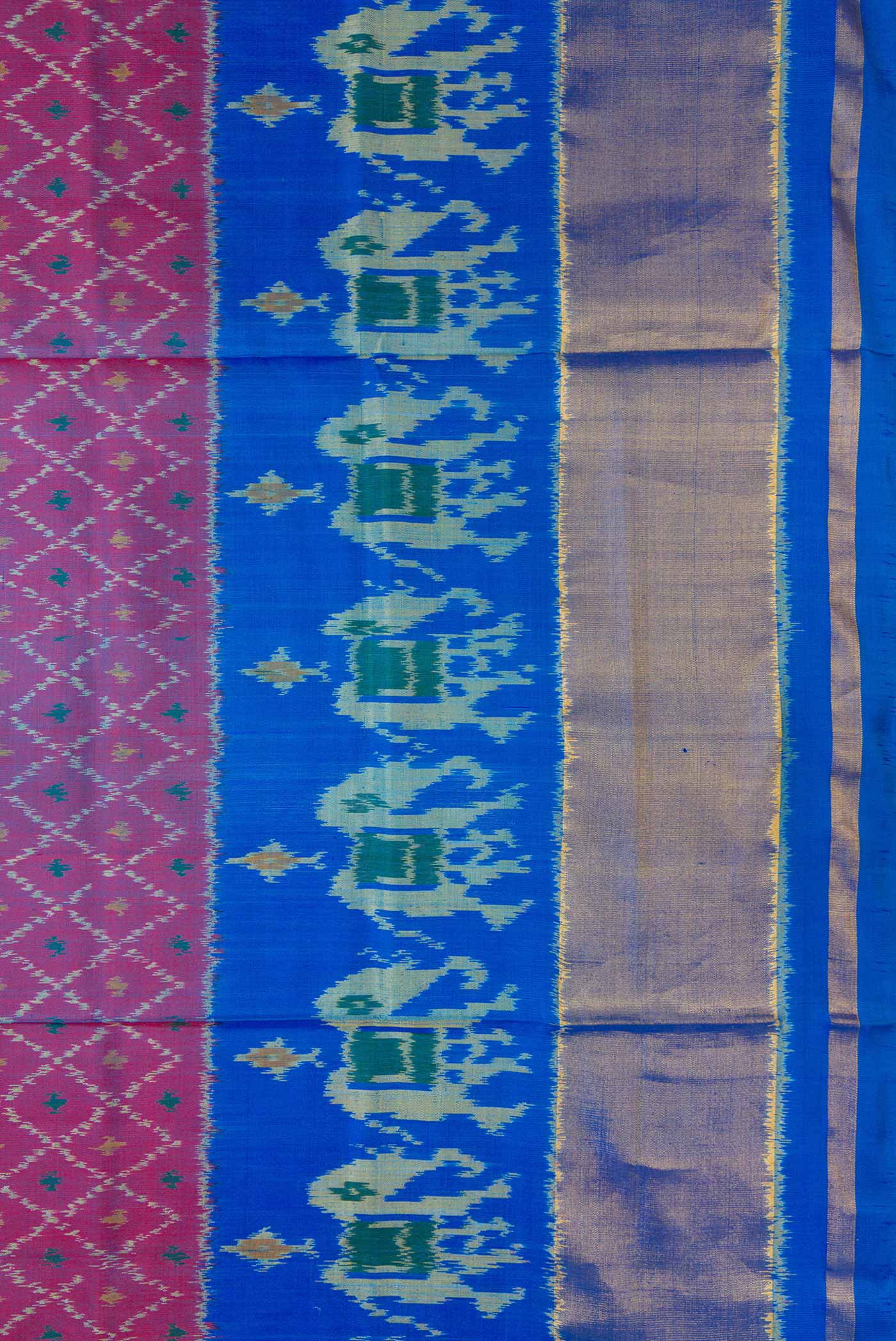 Border image of Purple Dual Tone Double Ikat Saree with Ikat Print on the body and Zari Border. 