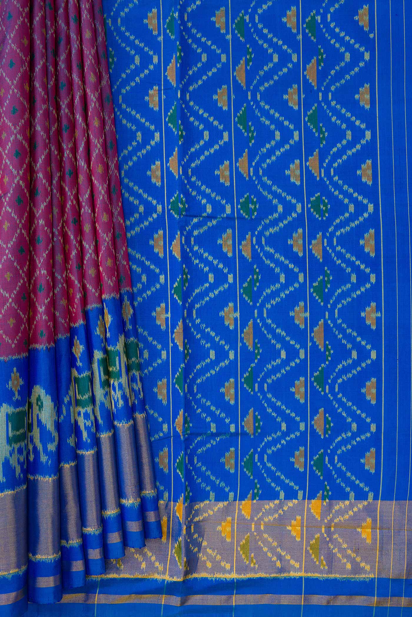 Pleats and pallu of Purple Dual Tone Double Ikat Saree with Ikat Print on the body and Zari Border. 