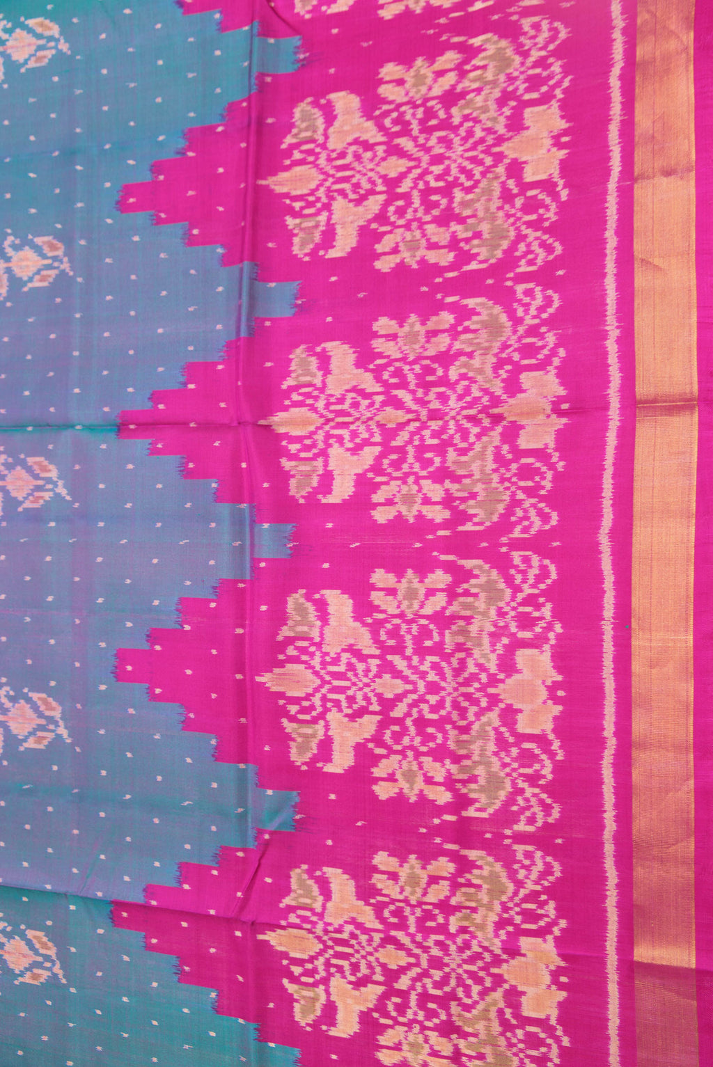 Border image of Peacock Blue Dual Tone Double Ikat Saree with Ikat Print on the body and Ikat Border. 