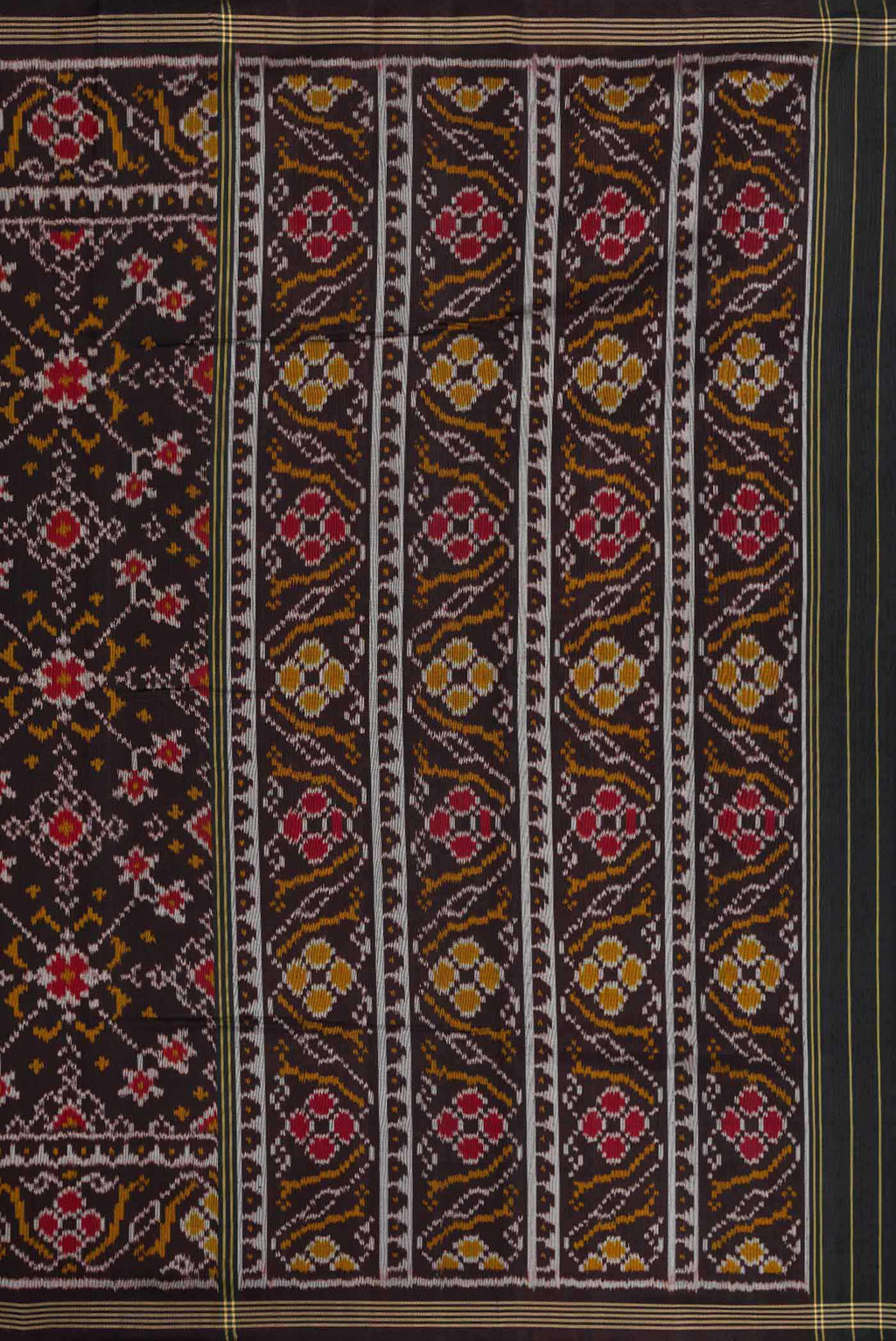 Close up image of the pallu of Black Dual Tone Rajkot Patola Silk Saree with Ikat Print on the body and Zari Border. 