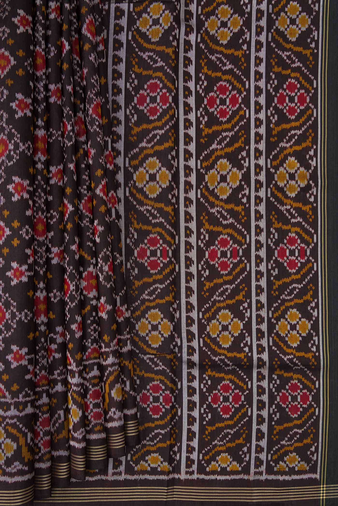 Pleats and pallu of Black Dual Tone Rajkot Patola Silk Saree with Ikat Print on the body and Zari Border. 
